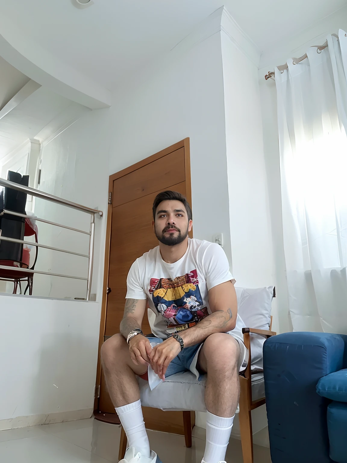 there is a man sitting in a chair in a room, Carmelo Blandino, Homem de 35 anos, david rios ferreira, caio santos, sentado no quarto, Homens de 35 anos, Foto realista, Retrato tirado 8 K, sentado em um lounge, sitting on the couch, edu souza, sitting on couch, icaro carvalho.