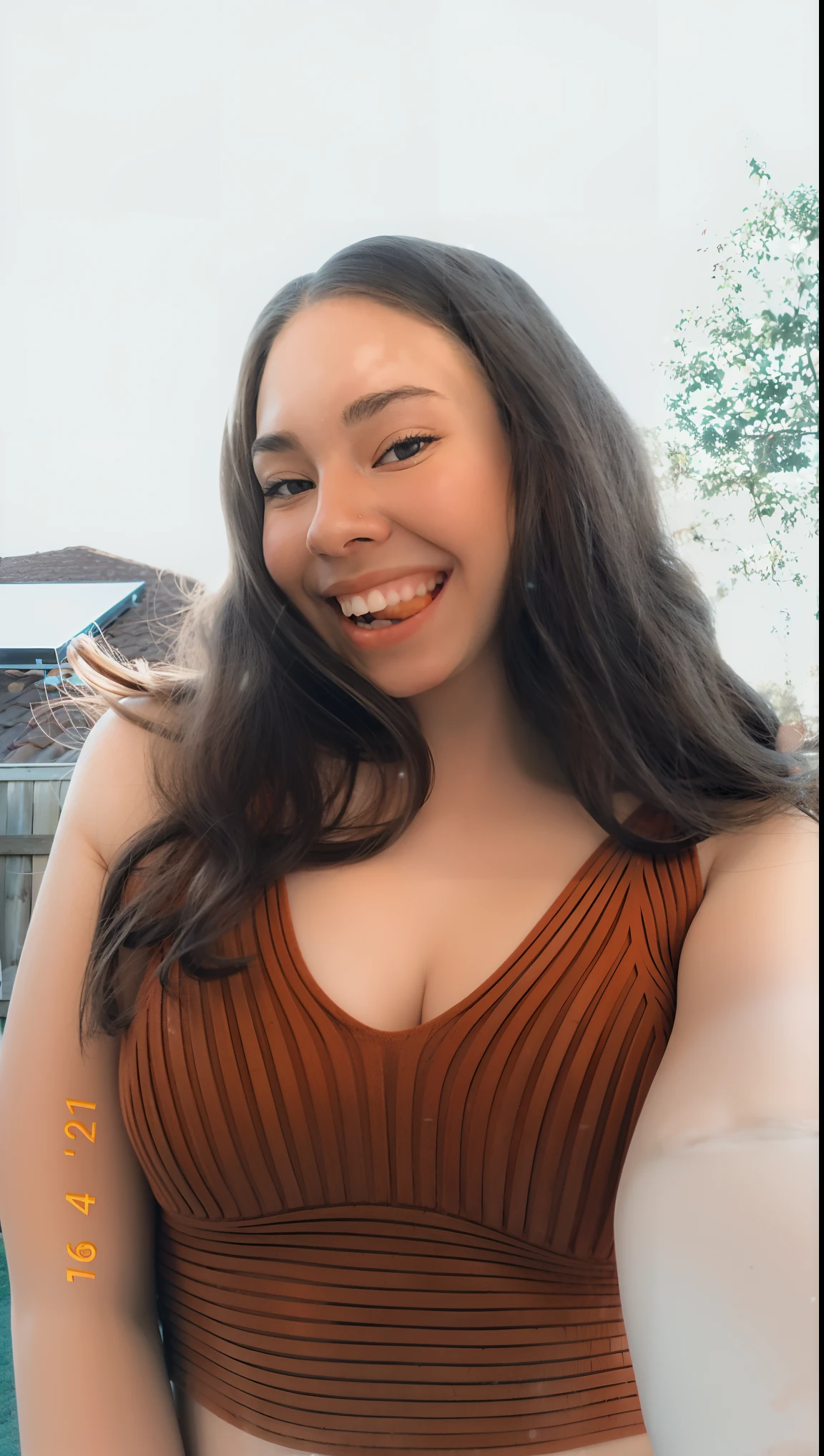 arafed woman in a brown top holding a banana in her hand, 18 years old, smiling seductively, beautiful and smiling, 1 8 yo, smiling and looking directly, she is smiling, 21 years old, happily smiling at the camera, 2 , violet myers, she is smiling and excited, smiling down from above, kailee mandel