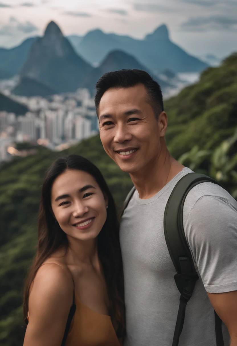 There was a selfie with a Chinese man and woman together,Rio de janeiro,The background is mountains --auto