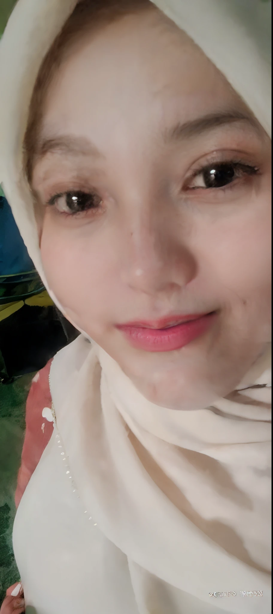 A Muslim woman is carrying out daily activities