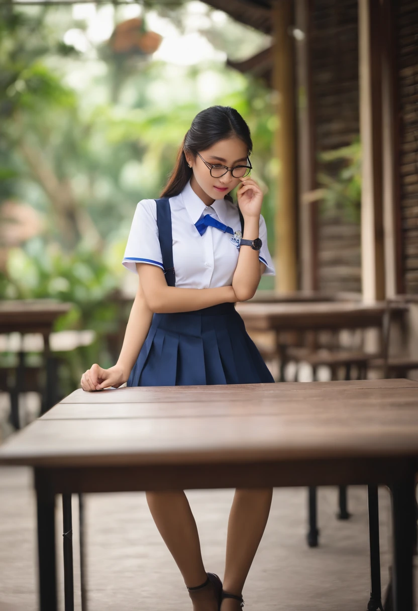 Beautiful Thai Girl In school uniform, short bulge. Put on your glasses, sit at a table.