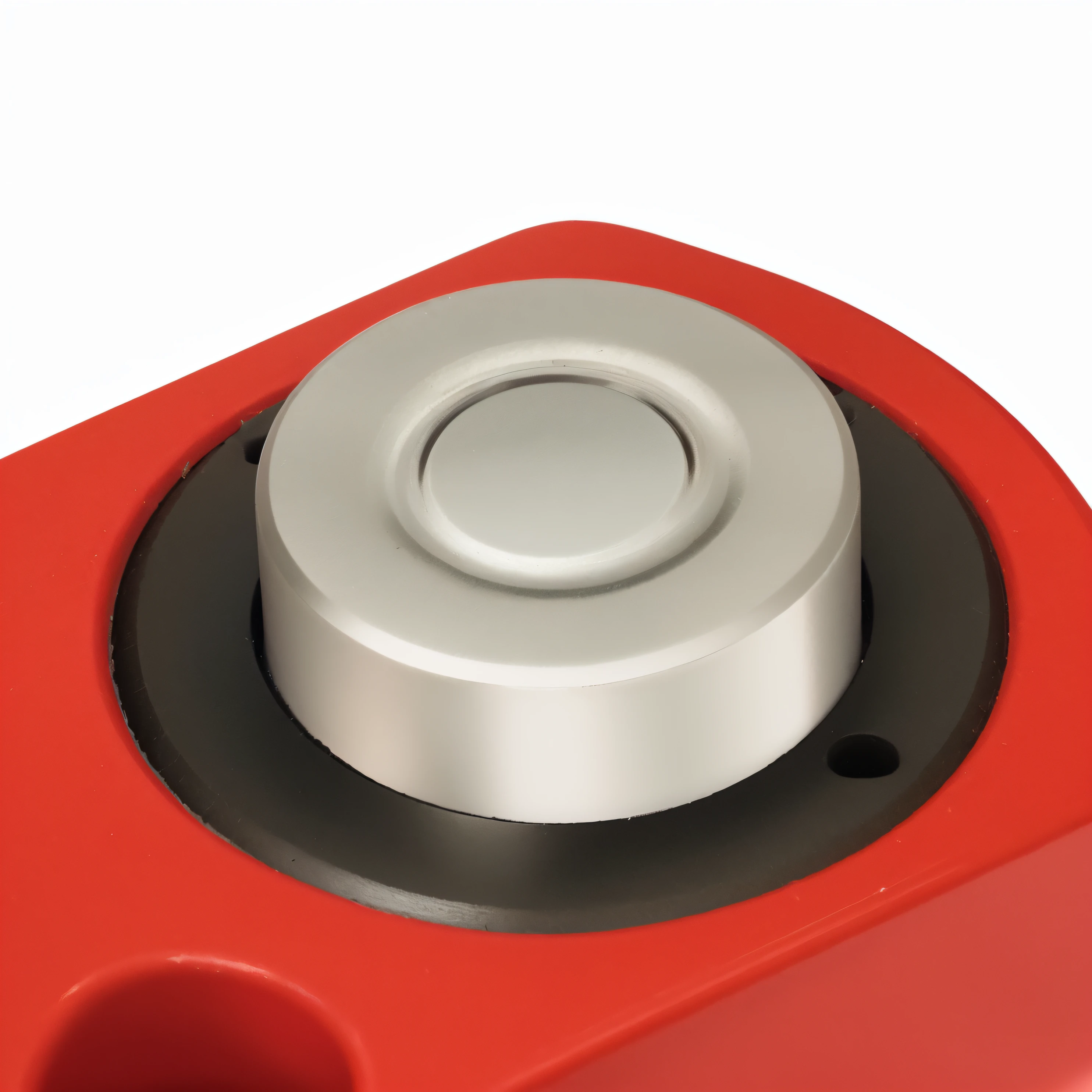 There is a red object,There is a metal button on it, close-up product photo, aluminium, Product photo, high detail product photo, high-angle view, Very dynamic, highly technical, high-resolution details, maxar, 100mm, Solid, 1 0 0 mm, detailed product image, detailed product photo, high angle close up shot, easy, technical