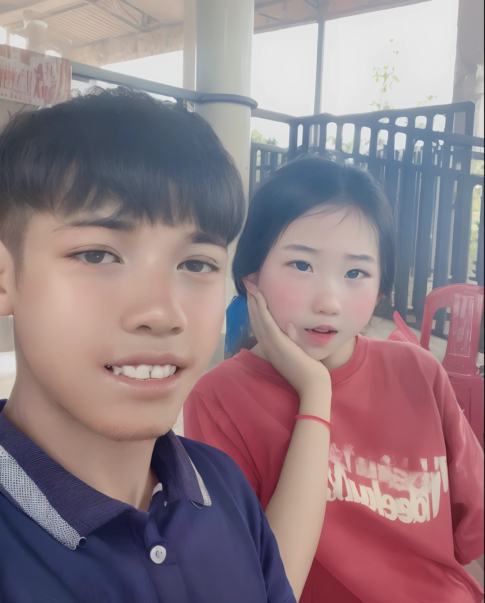 boy pins girl against wall