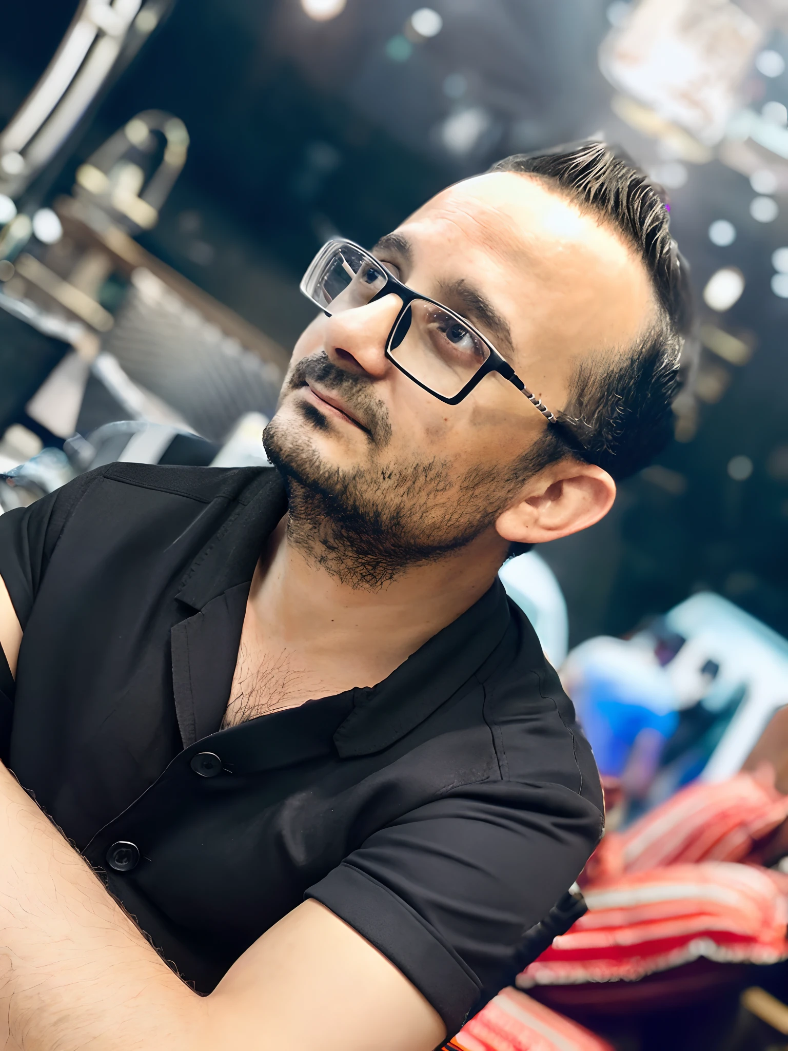 man wearing a casual shirt and a black blazer