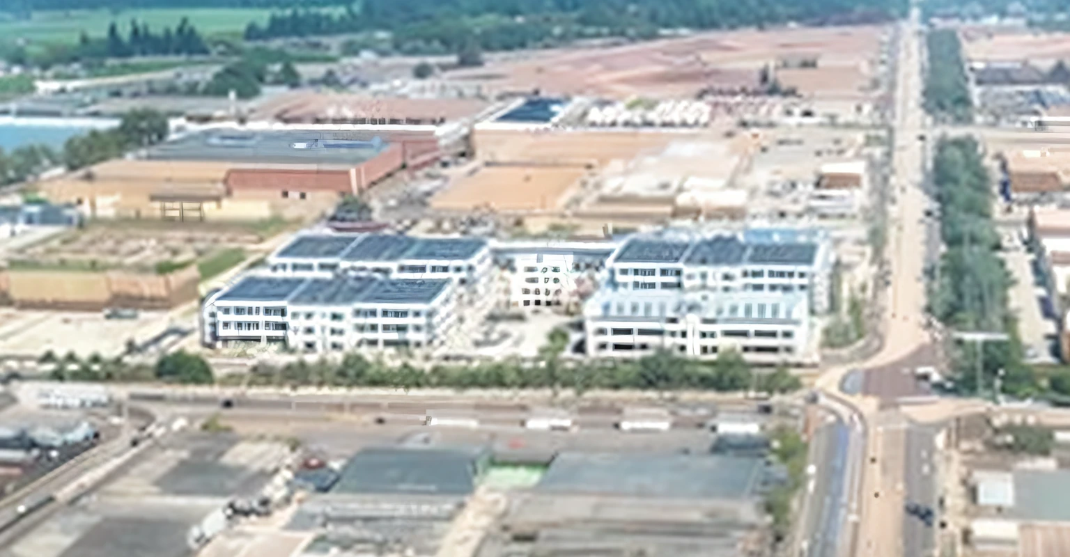 Aerial view of a large industrial area with roads and buildings, 1980s photo, 1 9 8 0 s photo, aerial shot, ariel view, aerial photograph, aerial viewyoji shinkawa, 2000s photo, medical research facility, photo taken from above, research complex, 90's photo, 1990's photo