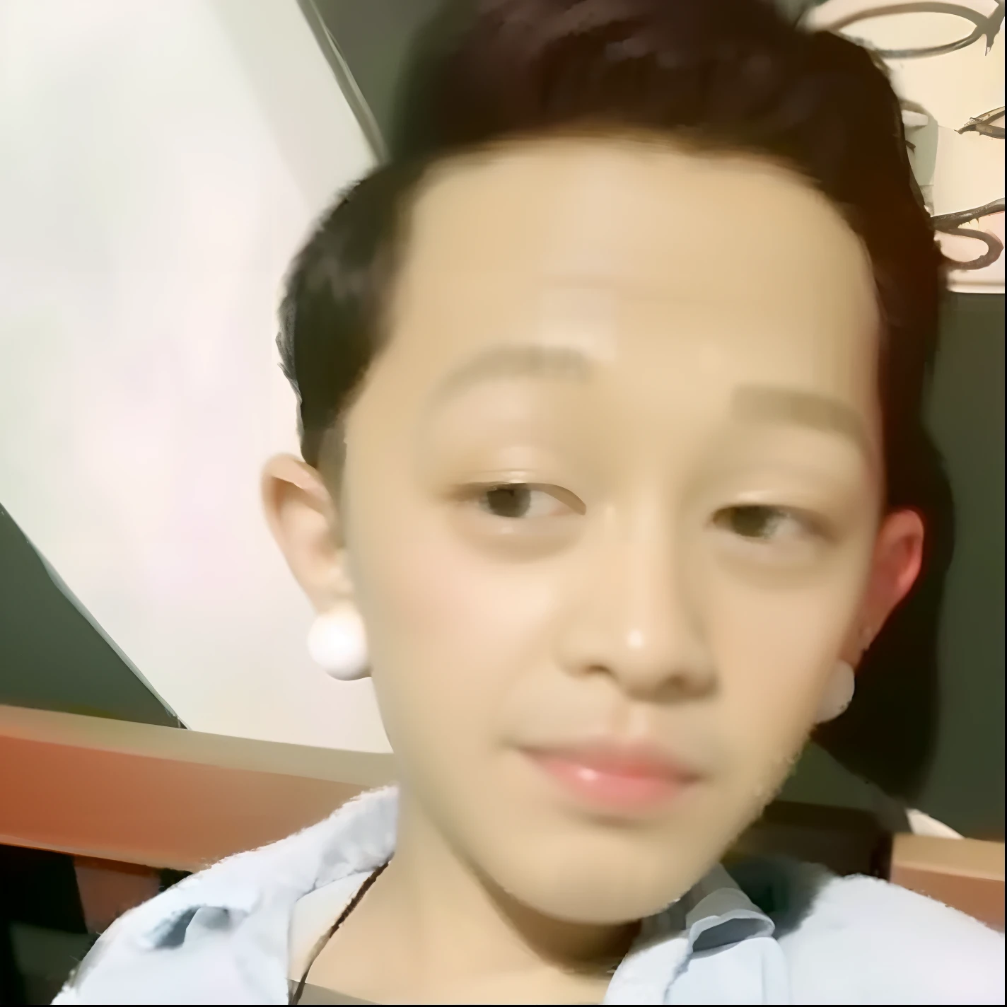 a close up of a person with a cell phone in their hand, 1 7 - - old thin face, ruan cute vtuber, with accurate face, boy thin face, he has an elongated head shape, ugly appearance, real ungine, face morph, boy has short black hair, 1 6 years oround face