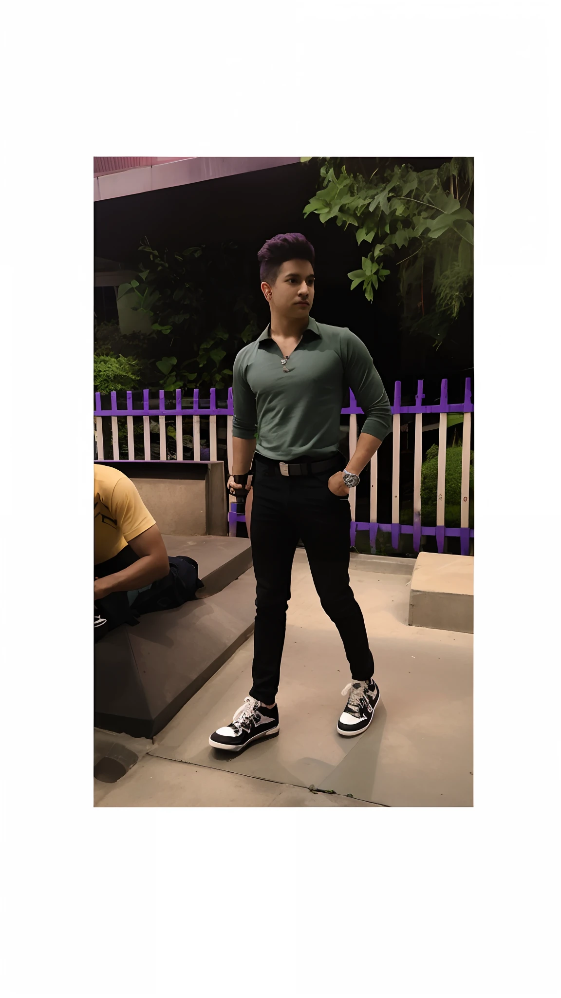 there is a man standing on a sidewalk with a skateboard, profile shot, posing as a jojo character, with a cool pose, inspired by Adam Dario Keel, full body photogenic shot, inspired by Randy Vargas, fullbody shot, casual pose, taken with sony alpha 9, full body picture, taken with the best dlsr camera, some green and purple, real ungine