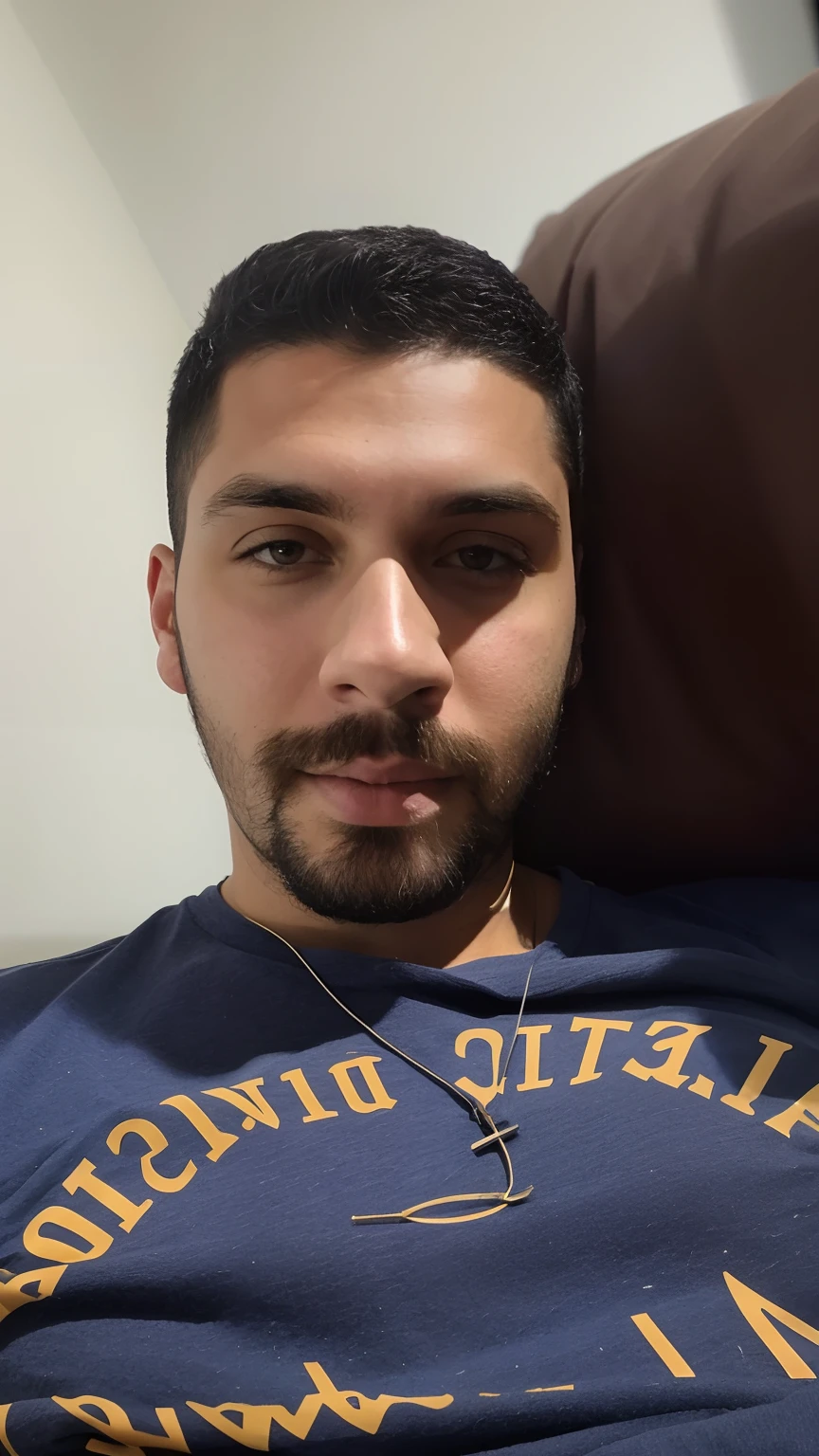 Man with beard and blue shirt sitting on a couch, em torno de 1 9 anos, taken in the early 2020s, imagem de qualidade muito baixa, sem barba, 2 7 anos, foto de perfil headshot, com uma barba pequena, 2 8 anos, cerca de 3 5 anos, sem barba, 2 3 anos