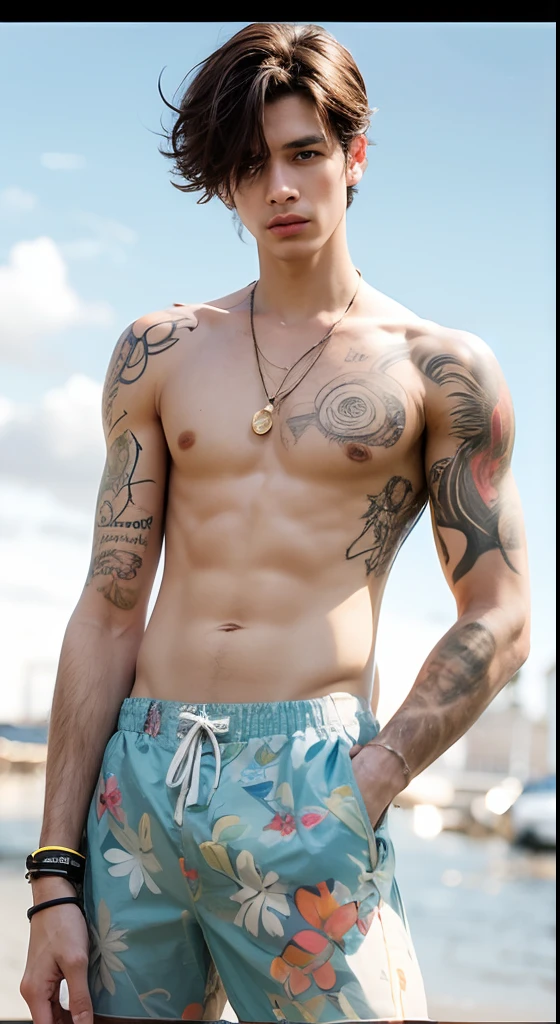 A boy without a shirt wearing blue shorts