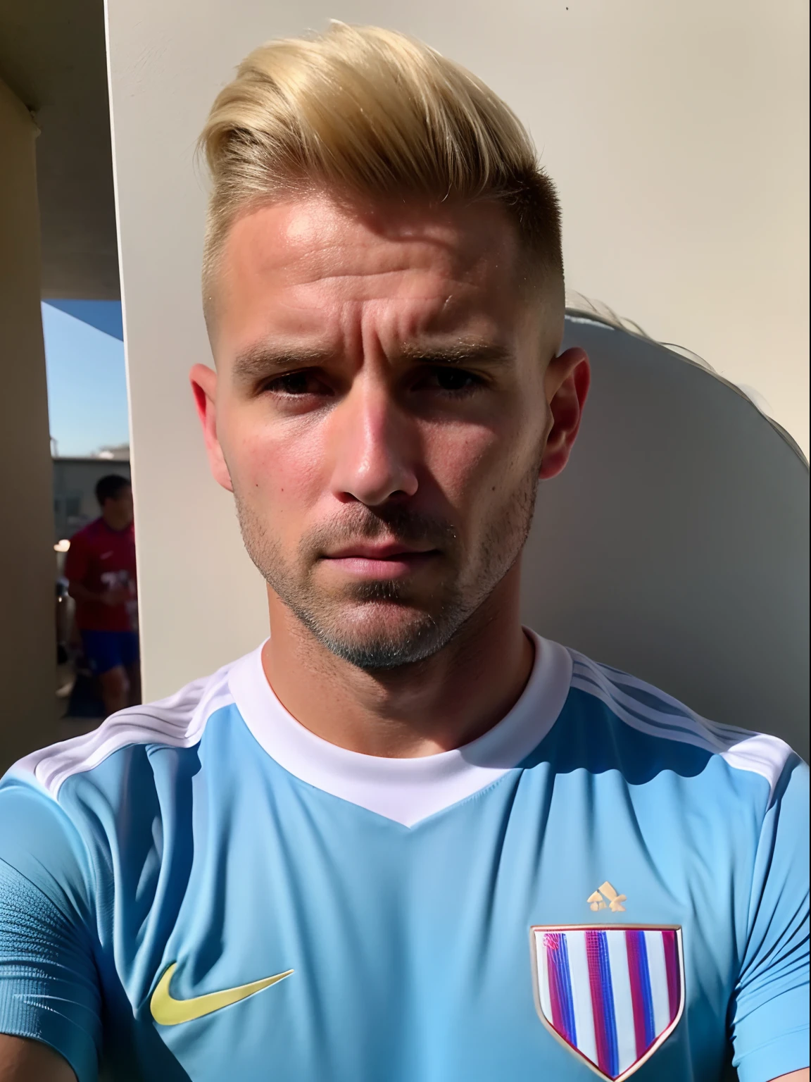 Male Soccer Player with Platinum Hair in Atletico Madrid, tatuagens