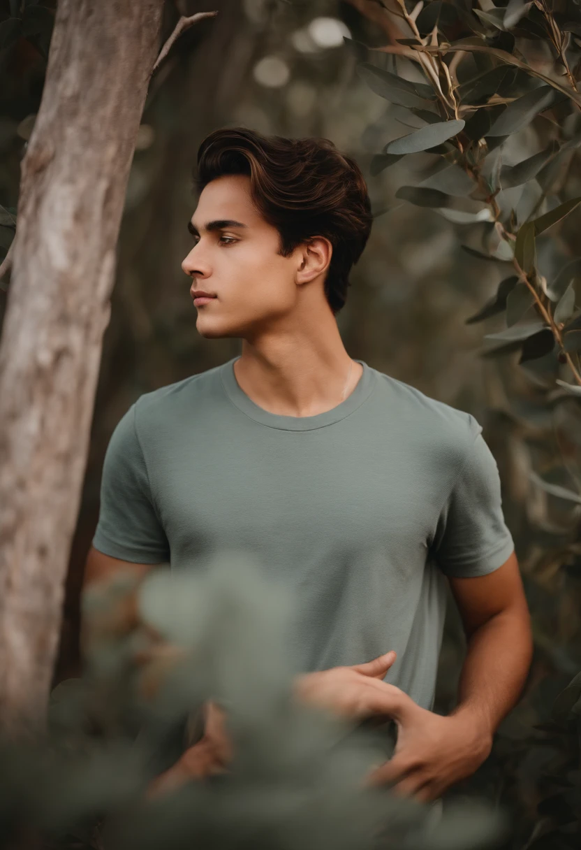 20-year-old man in front of a eucalyptus plantation