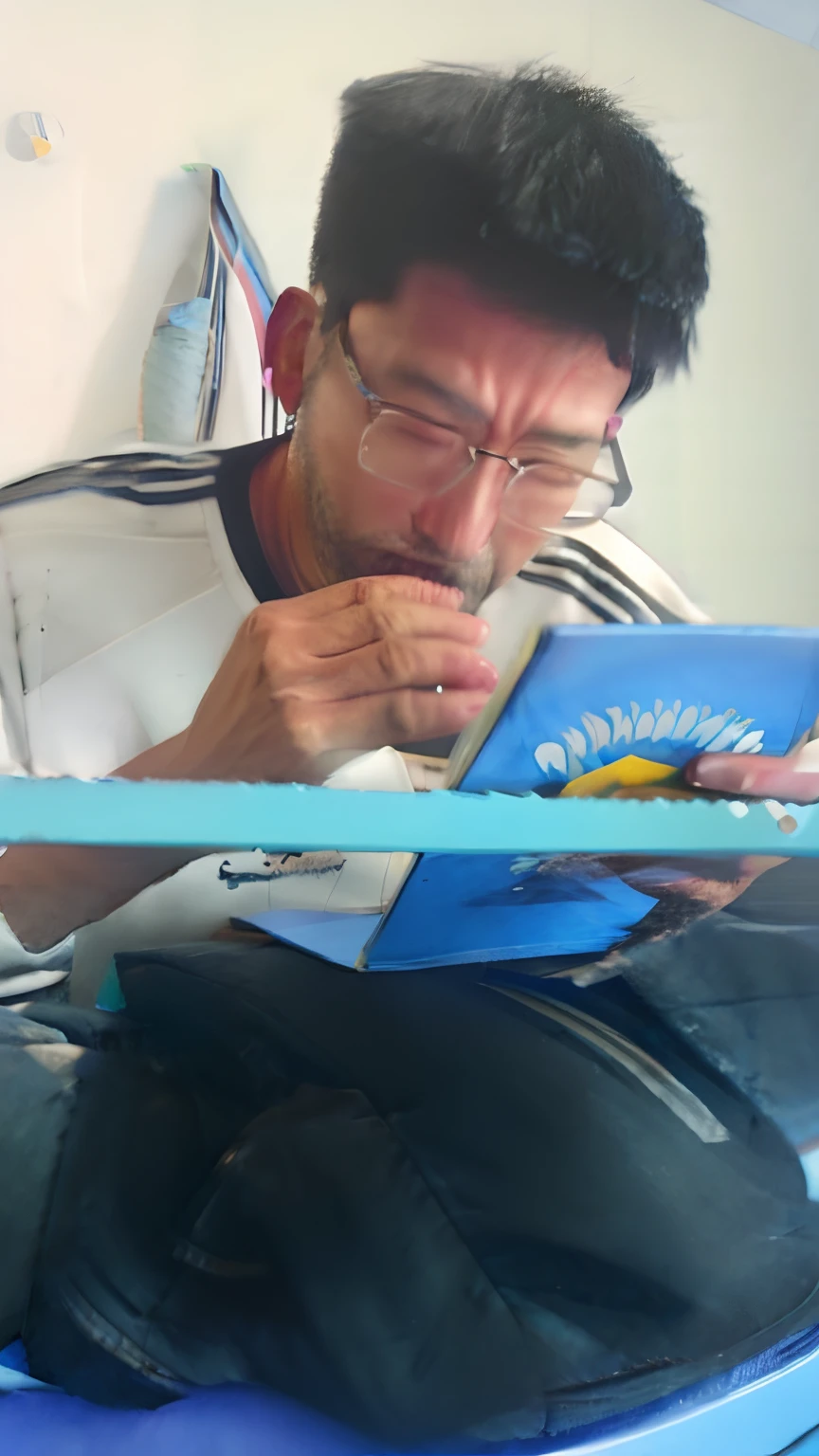 The Alafidian man sits in a blue chair reading a book, chinese artist, Sketch in his notebook, korean artist, Trunking Art Station, took on ipad, Kim Tae-joon, trying to read, reading new book, Inspired by Ding Guanpeng, inspired by Yeong-Hao Han, inspired by Cao Buxing, paining, random artist