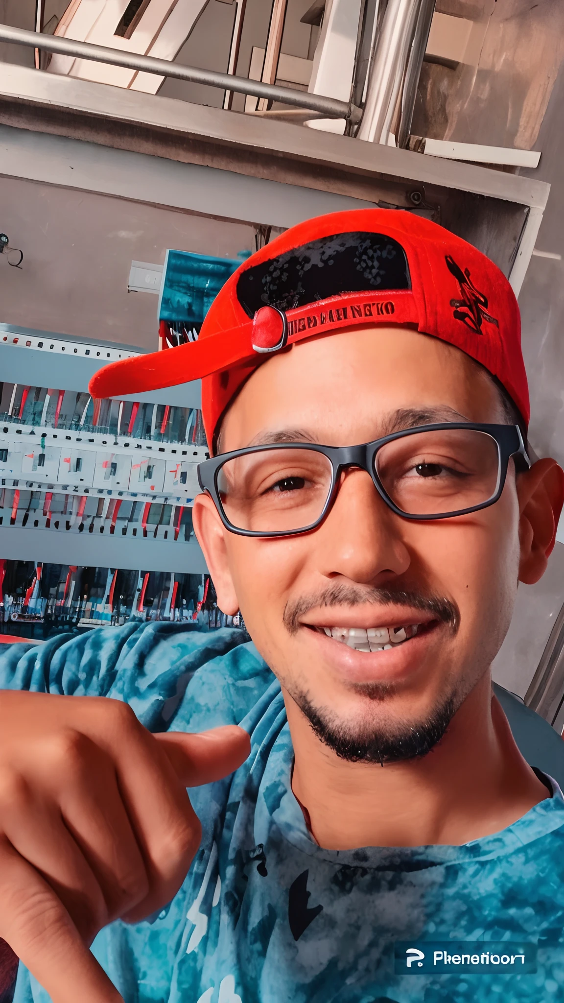 There's a man wearing a red hat and glasses braces on his teeth , fomato disney pixel
