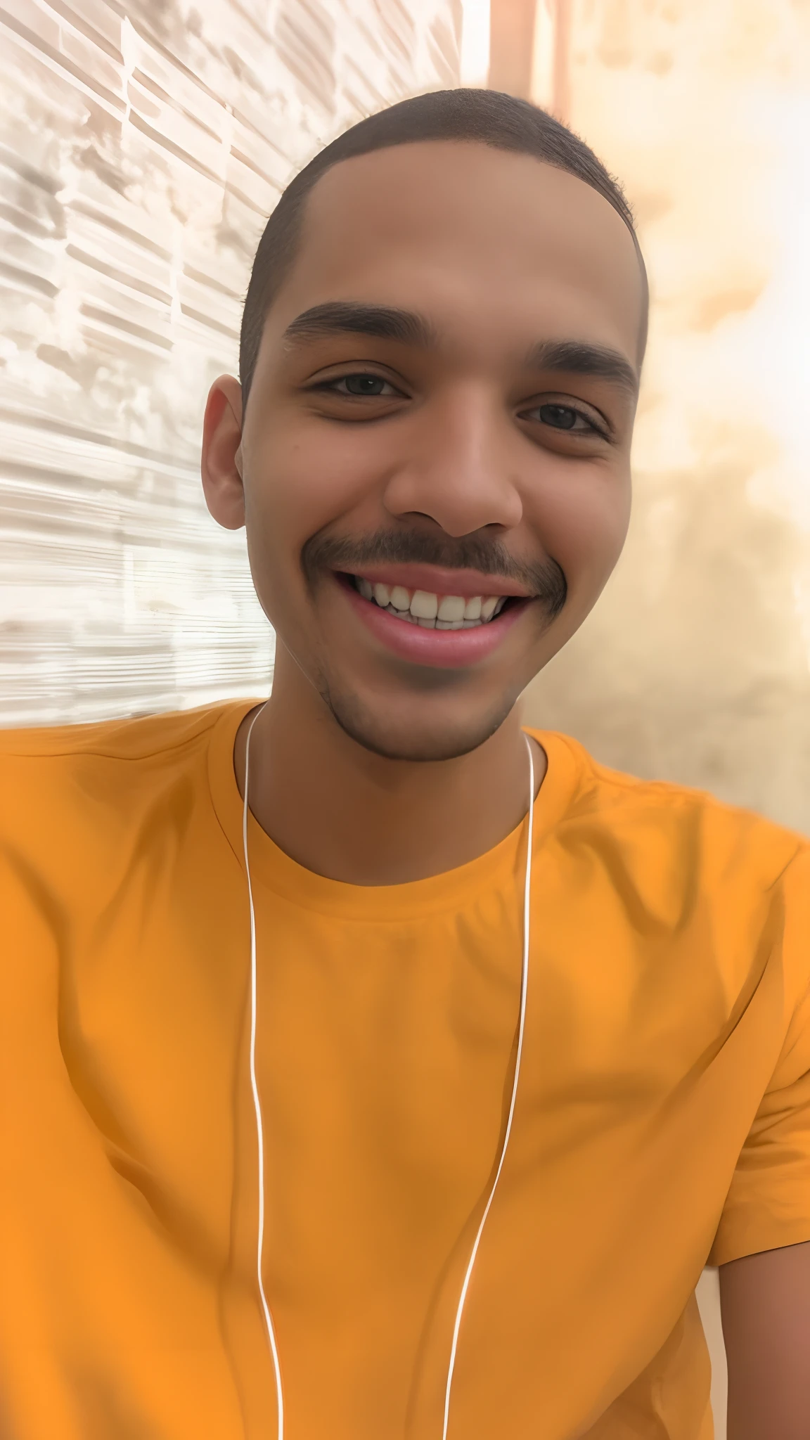 Homem sorridente com fones de ouvido e uma camisa amarela sentado em frente a uma parede de tijolos, Riyahd Cassiem, em torno de 1 9 anos, foto de perfil headshot, inspired by Antônio Parreiras, Streamer do Twitch / Jogador Ludwig, com um lindo sorriso, he's smiling, jordan lamarre - wan, sorriso detalhado