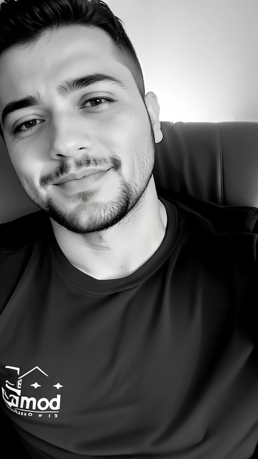 arafed man sitting on a couch with a remote control in his hand, taken in the early 2020s, dessaturados!!, imagem de qualidade muito baixa, foto de perfil headshot, imagem em preto e branco, tiradas no final dos anos 2000, foto do snapchat, taken in the late 2010s, com barba e camisa preta