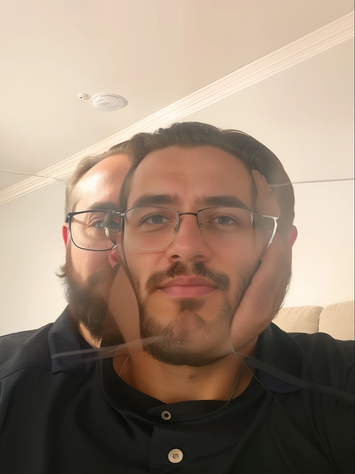 Man with beard and blue shirt sitting on a couch, em torno de 1 9 anos, com uma barba pequena, imagem de qualidade muito baixa, 2 3 anos, 2 2 anos, imagem frontal, 2 7 anos, barba pequena, 2 4 anos, 21 anos, sem barba e bigode, sem barba