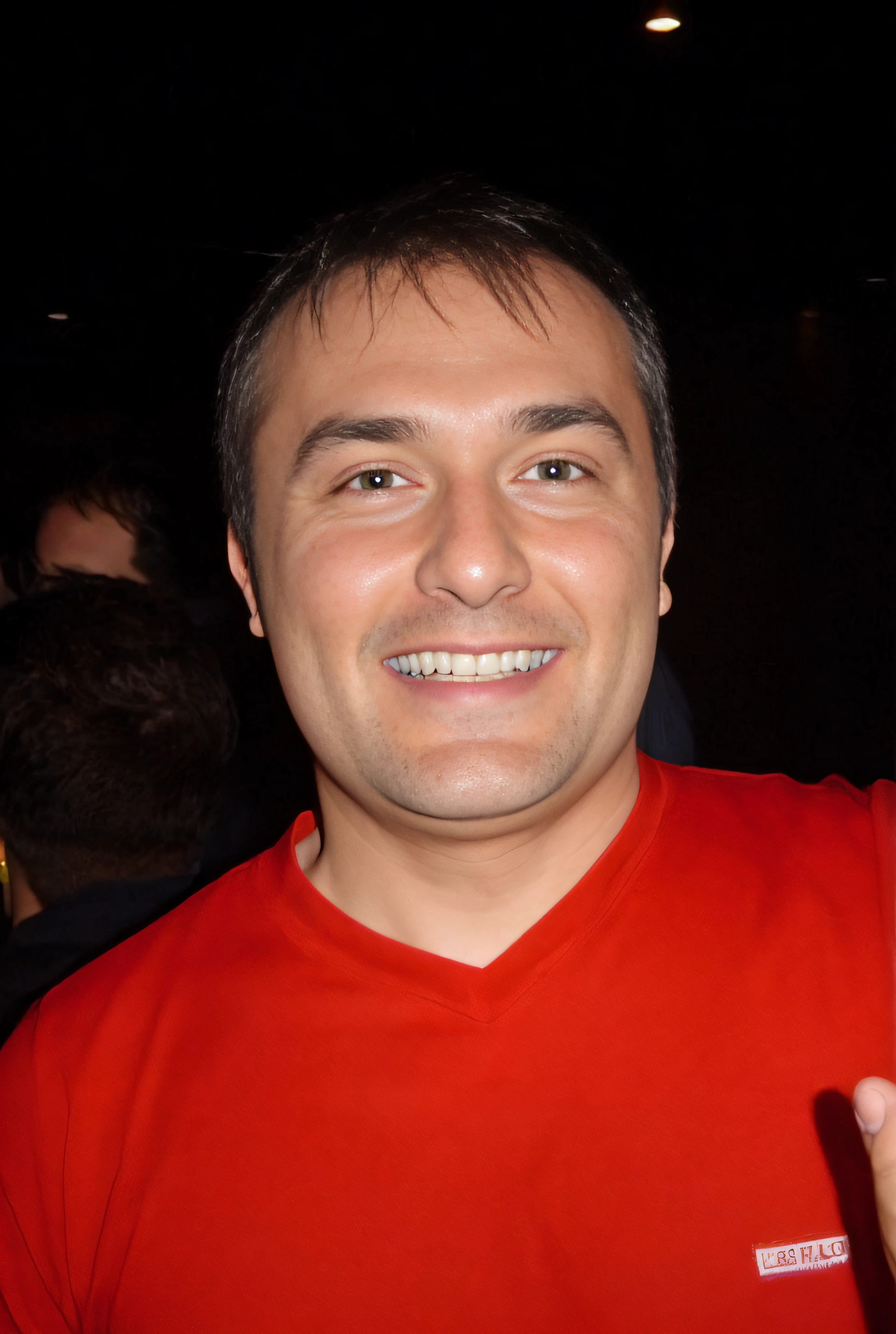 A man with red shirt.