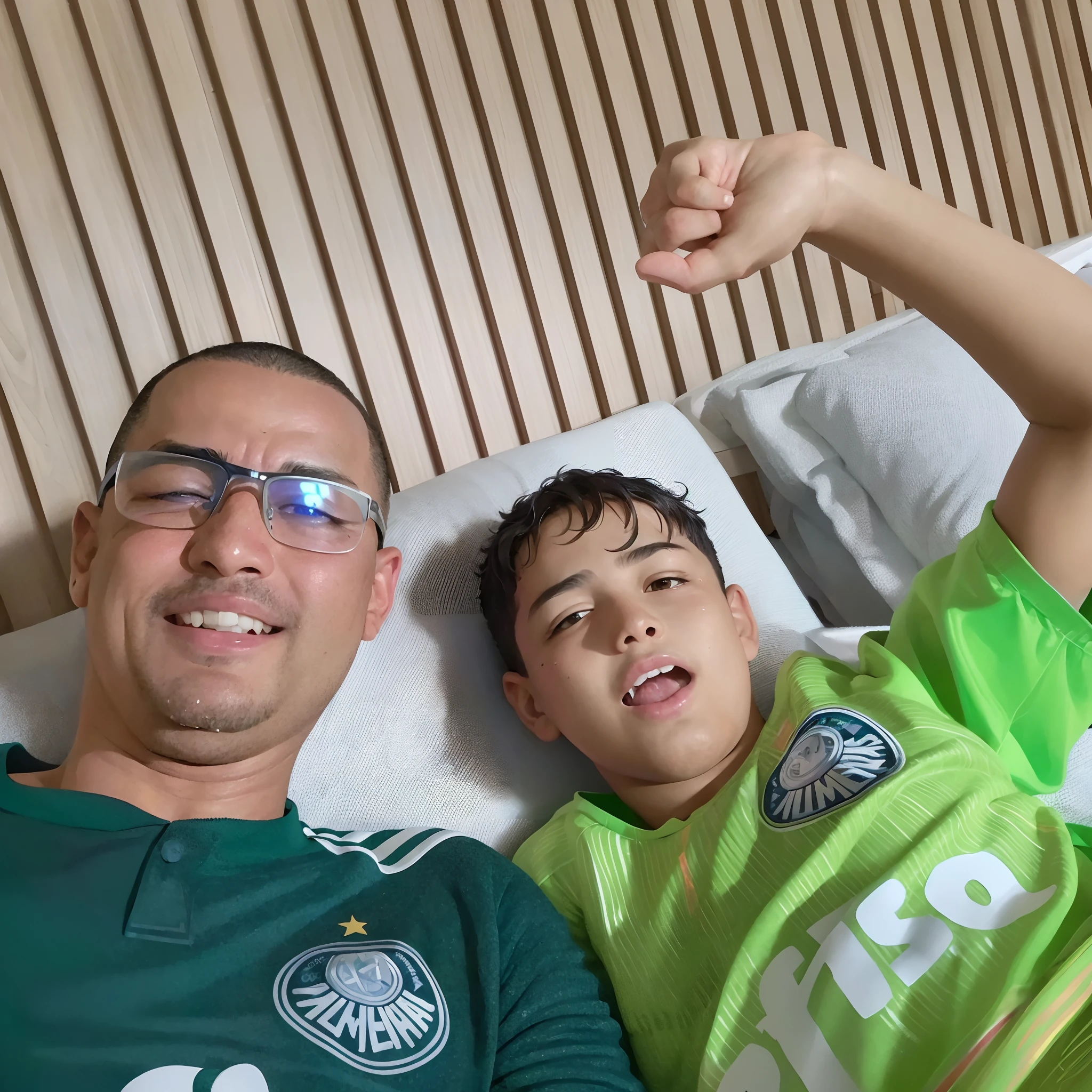 there is a man and a boy laying in bed together, ronaldo luis nazario de lima, ronaldo luis nazario da lima, with a kid, mateus 9 5, ronaldo nazario fenomeno, ronaldo nazario, caio santos, in sao paulo, dan dos santos, relaxing after a hard day, john picacio and brom, sao paulo