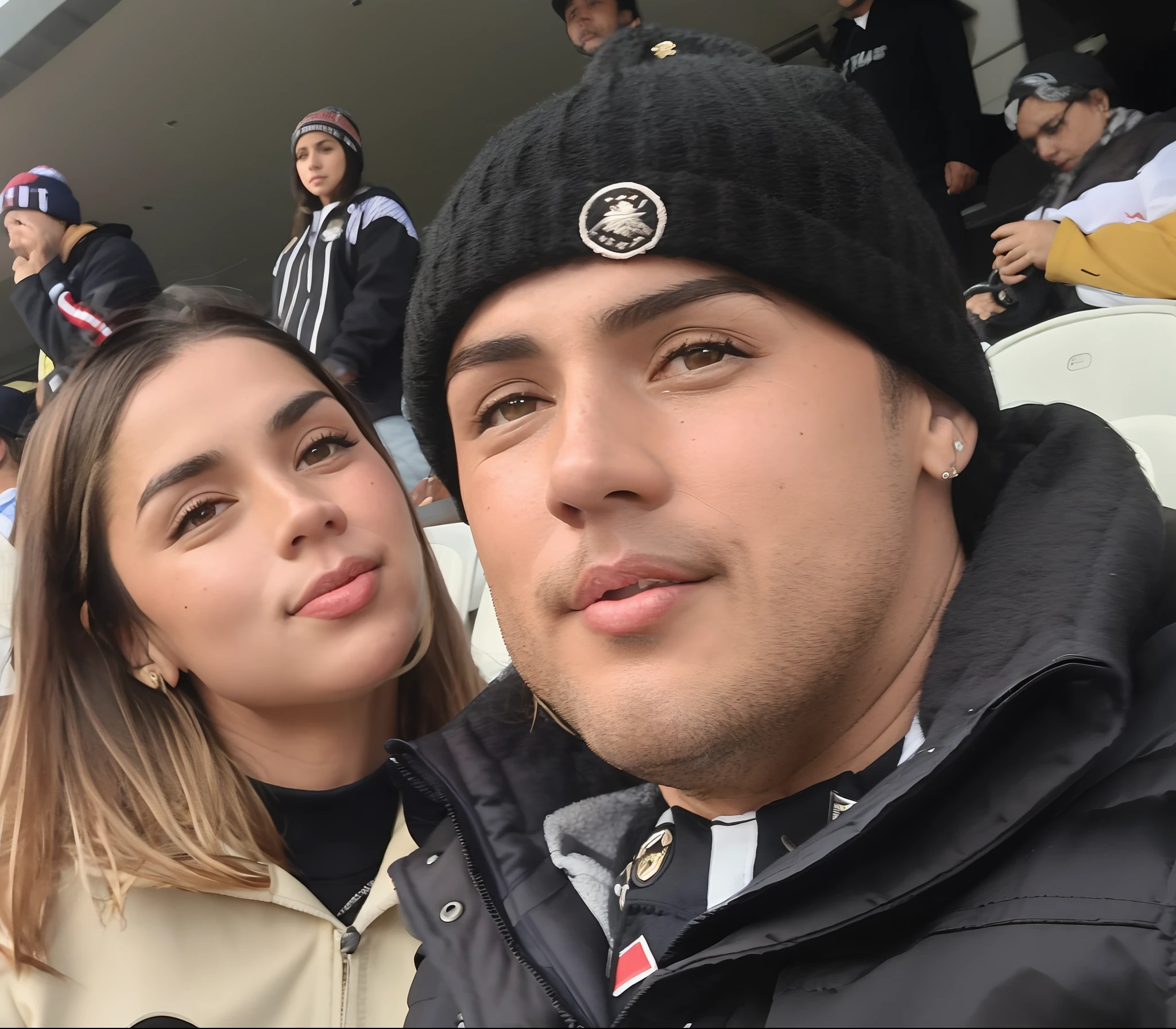 Lovers wearing Beşiktaş jerseys celebrate the championship cup  