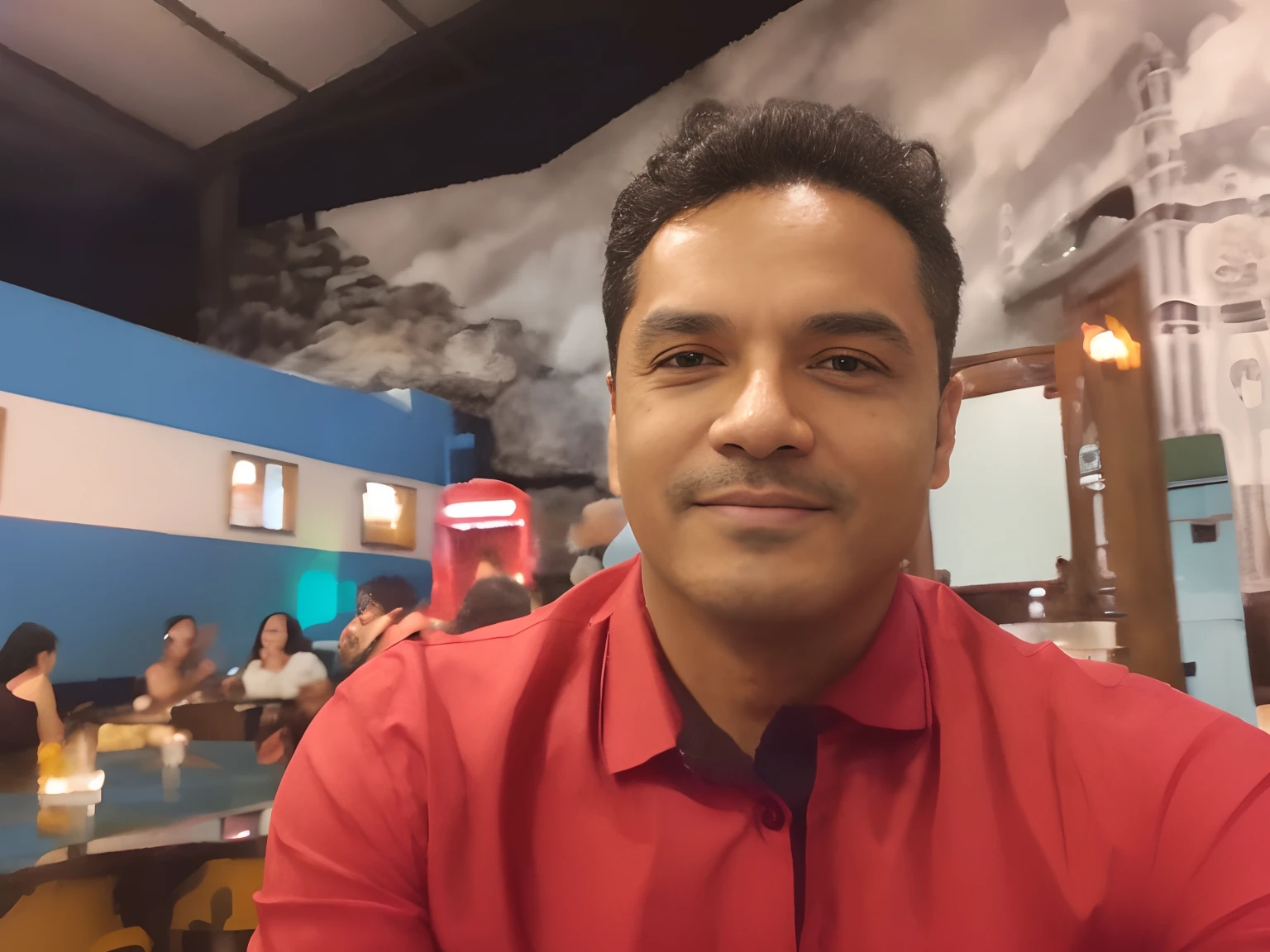 There's a man sitting at a restaurant table, david rios ferreira, Homem de 4 0 anos, cerca de 3 5 anos, caio santos, (38 anos), Nivanh Chanthara, edu souza, Thawan Duchanee, Postagem no Reddit, Mohamed Chahin, Carmelo Blandino, foto do perfil, zigor samaniego
