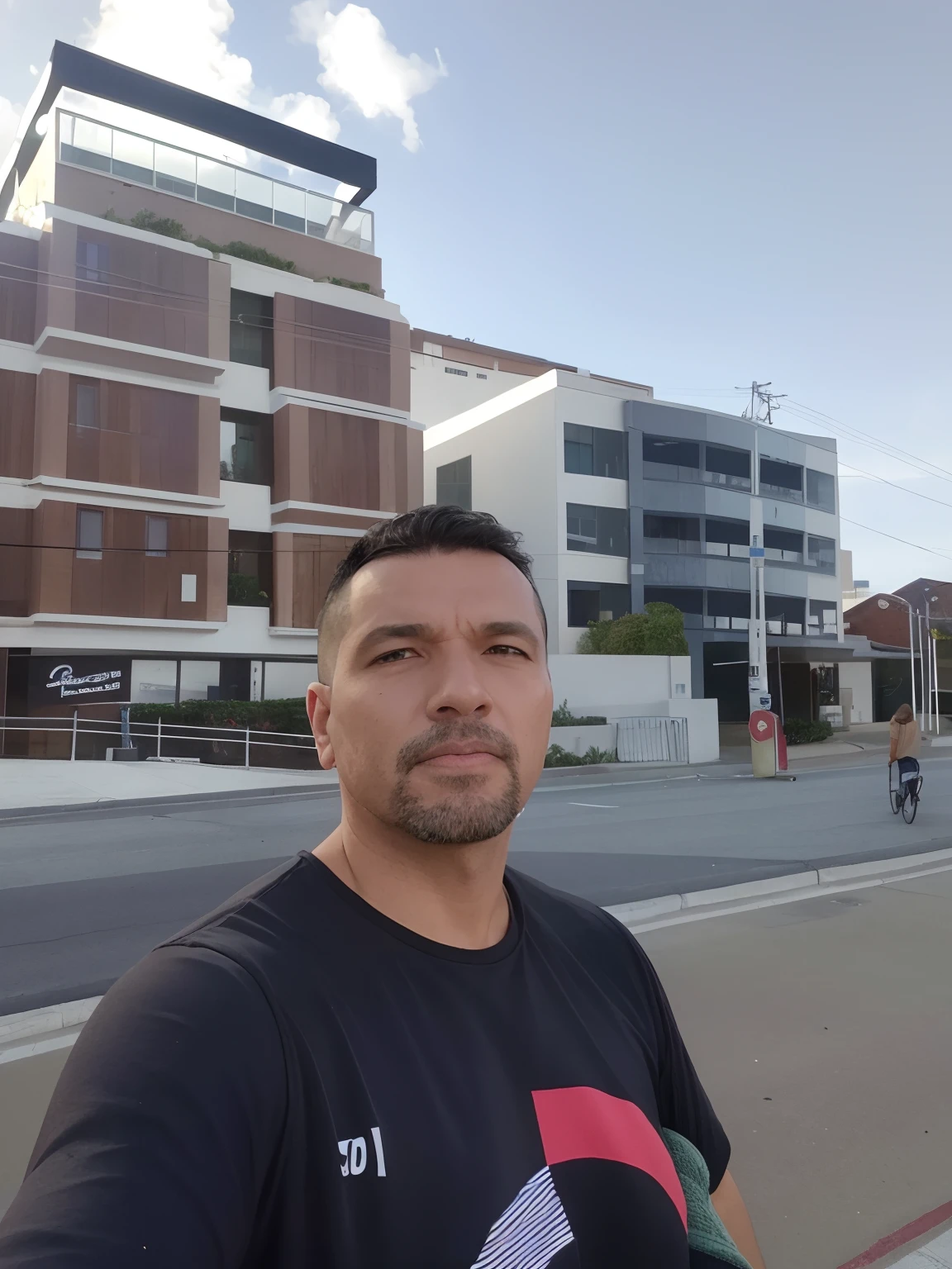 There's a man standing on the side of the road in front of a building, manly, Homem de 4 0 anos, 3 6 anos, 38 anos, 3 2 anos, taken in the early 2020s, 35 anos, 3 5 anos, Homens de 45 anos, cerca de 3 5 anos