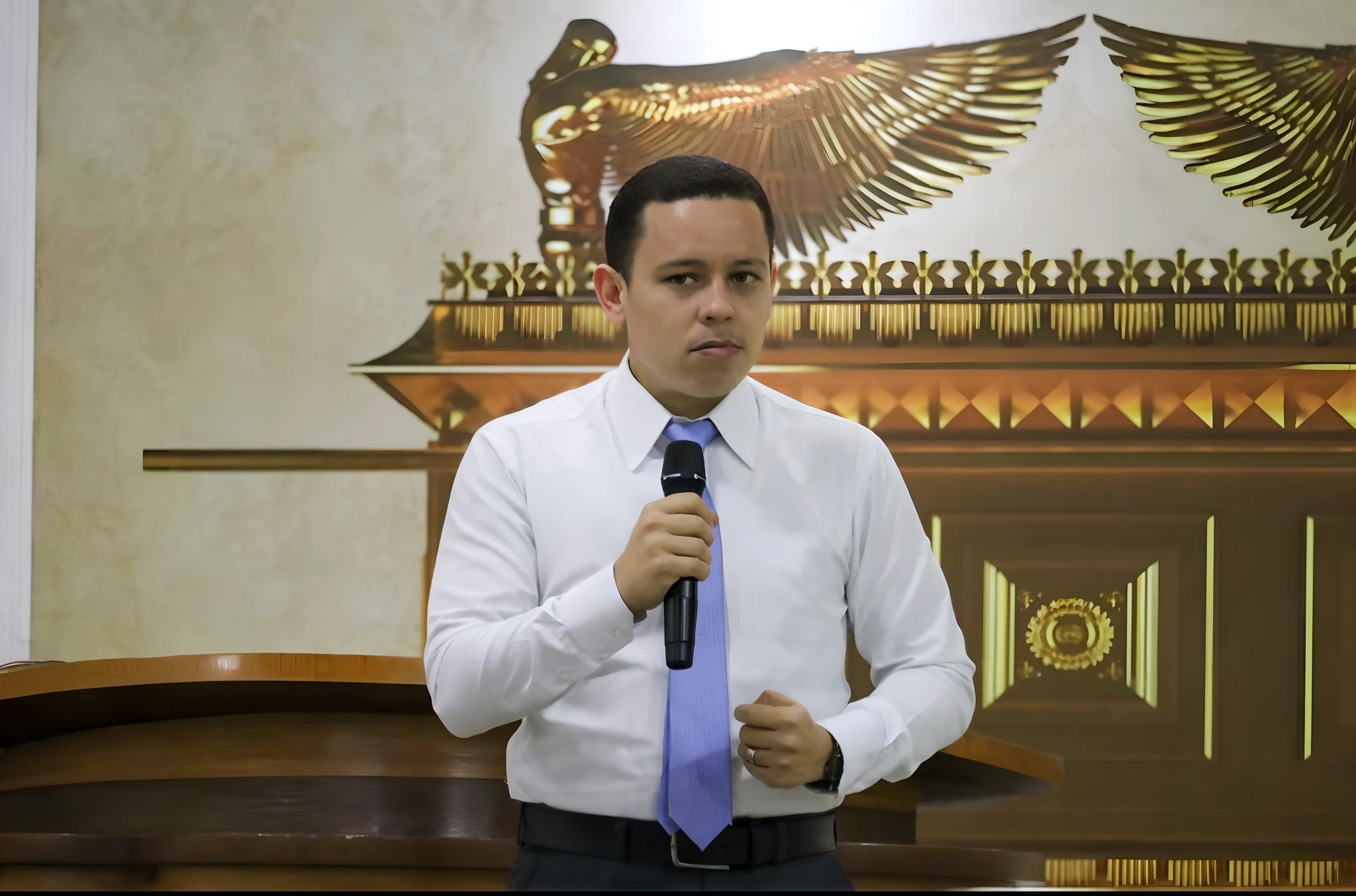 There's a man standing on a podium with a microphone, john jude palencar, Mohamed Chahin, Eduardo Rucha, henry ascensio, Joel Torres, Eloy Morales, andres rios, Alex Flores, ramil sunga, Cristiano Orrillo, Carlos Ortega Elizalde, zigor samaniego, eliran kantor, david rios ferreira