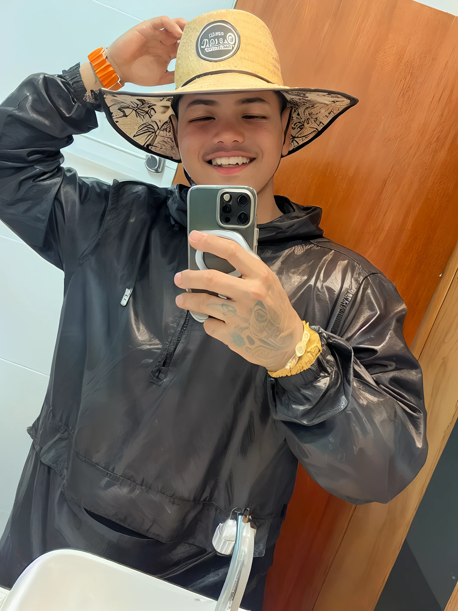 Boy in hat taking picture