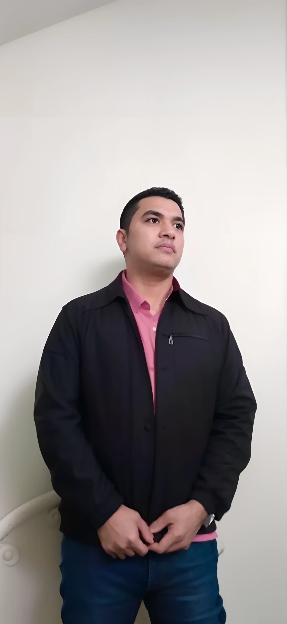 Man in black jacket and pink shirt standing in a room, andres rios, Eloy Morales, Jose Miguel Romano Francisca, victor maristane, juan diaz canales, Cristiano Orrillo, Carlos Ortega Elizalde, Salustiano Garcia Cruz, zigor samaniego, luiz escanuela, danilo torres, Alejandro