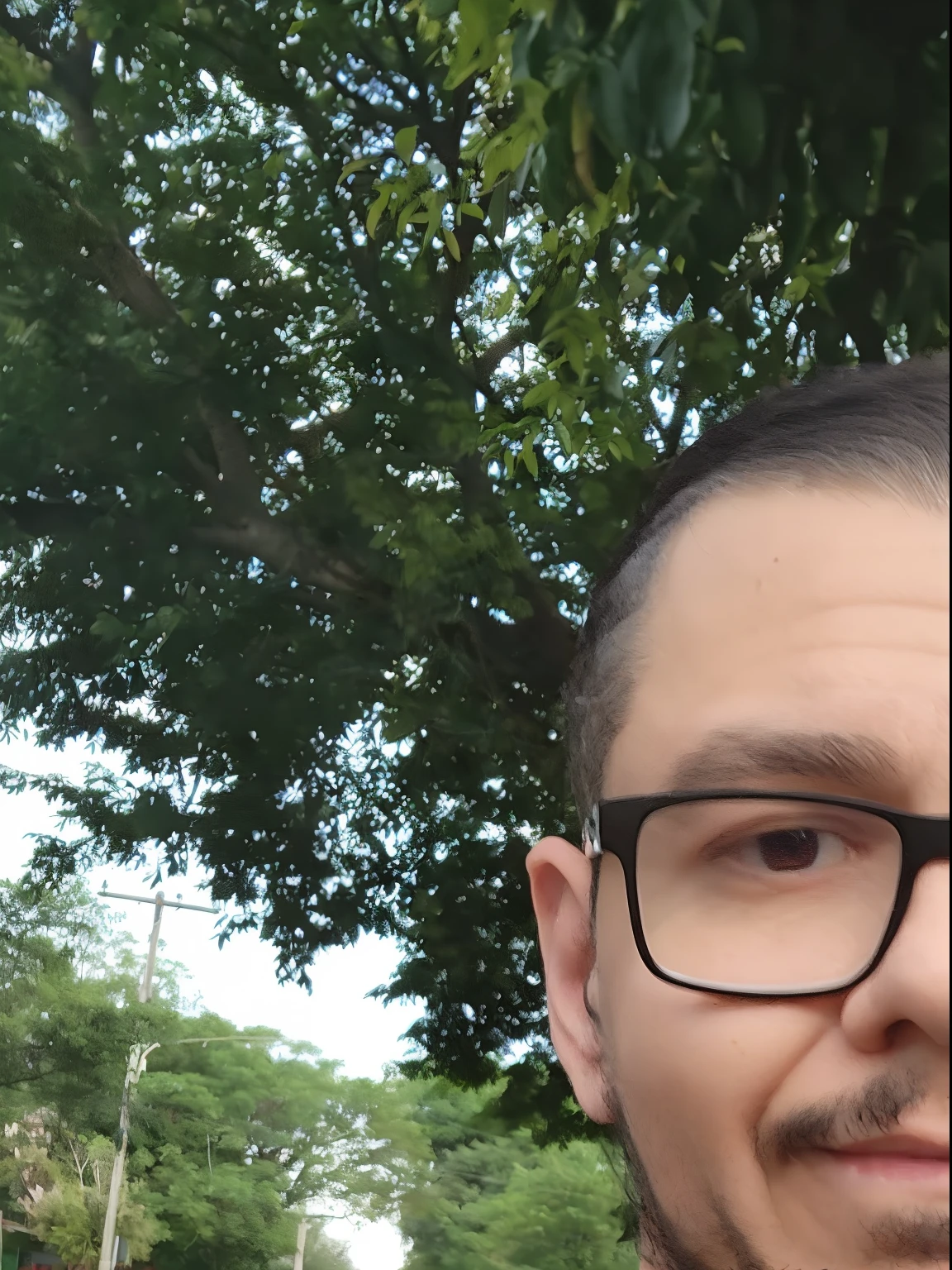 there is a man with glasses and a beard standing in front of a tree, david rios ferreira, carmelo blandino, icaro carvalho, caio santos, Henry Alvim Correa, frontal picture, joseph moncada, andres rios, dan dos santos, luis melo, edu souza, victor maristane, luiz escanuela