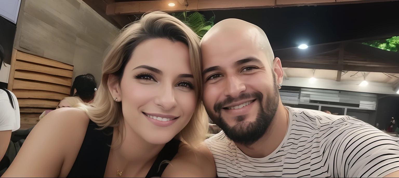 there is a man and woman that are smiling for a picture,