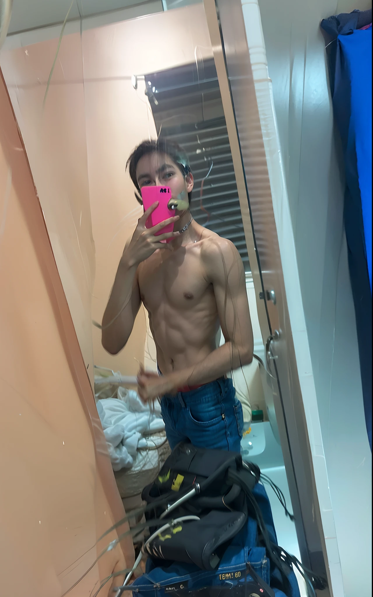 there is a man taking a picture of himself in the mirror, fit pic, 1 8 years old, 1 7 years , he is about 17 e is about 1 8 years old, 1 7 years old, 1 8 years old, 1 9 years old, 1 7 years old, he is! about 1 7 years old.