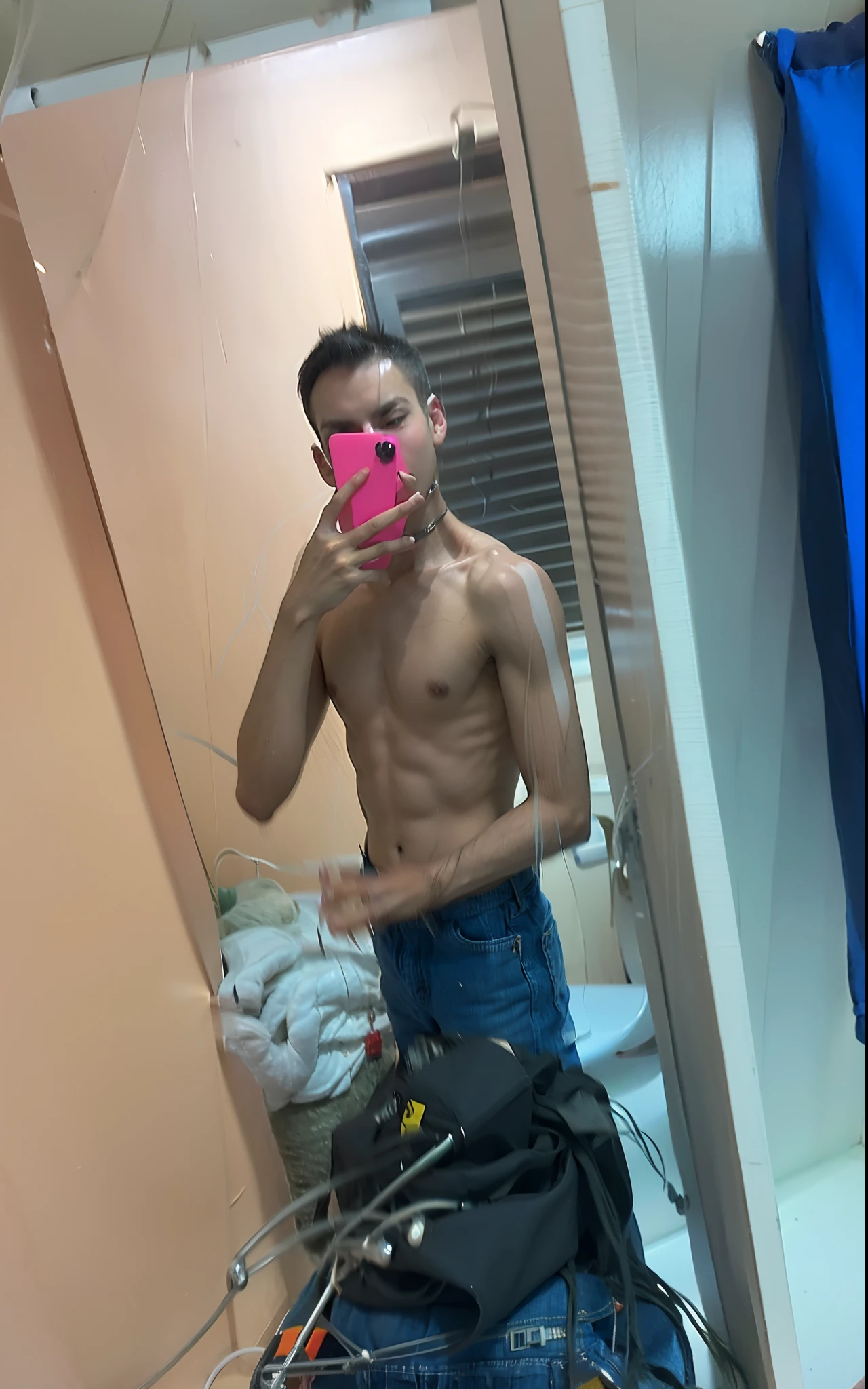 there is a man taking a picture of himself in the mirror, fit pic, 1 8 years old, 1 7 years , he is about 17 e is about 1 8 years old, 1 7 years old, 1 8 years old, 1 9 years old, 1 7 years old, he is! about 1 7 years old.