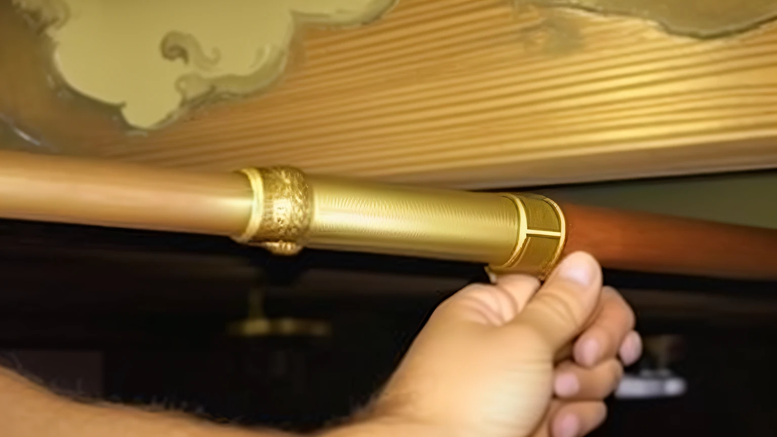 someone is holding a pipe that is attached to a wooden shelf, gold pipelines, brass pipes on the walls, crack pipe, odd pipes, with pipes attached to it, water pipe, extremely intricate, broken pipes, pipe, brass, leaking, brass and steam technology, with large golden pipes, high detail photo, piping, pipes, holding a gold! cane! make it unique