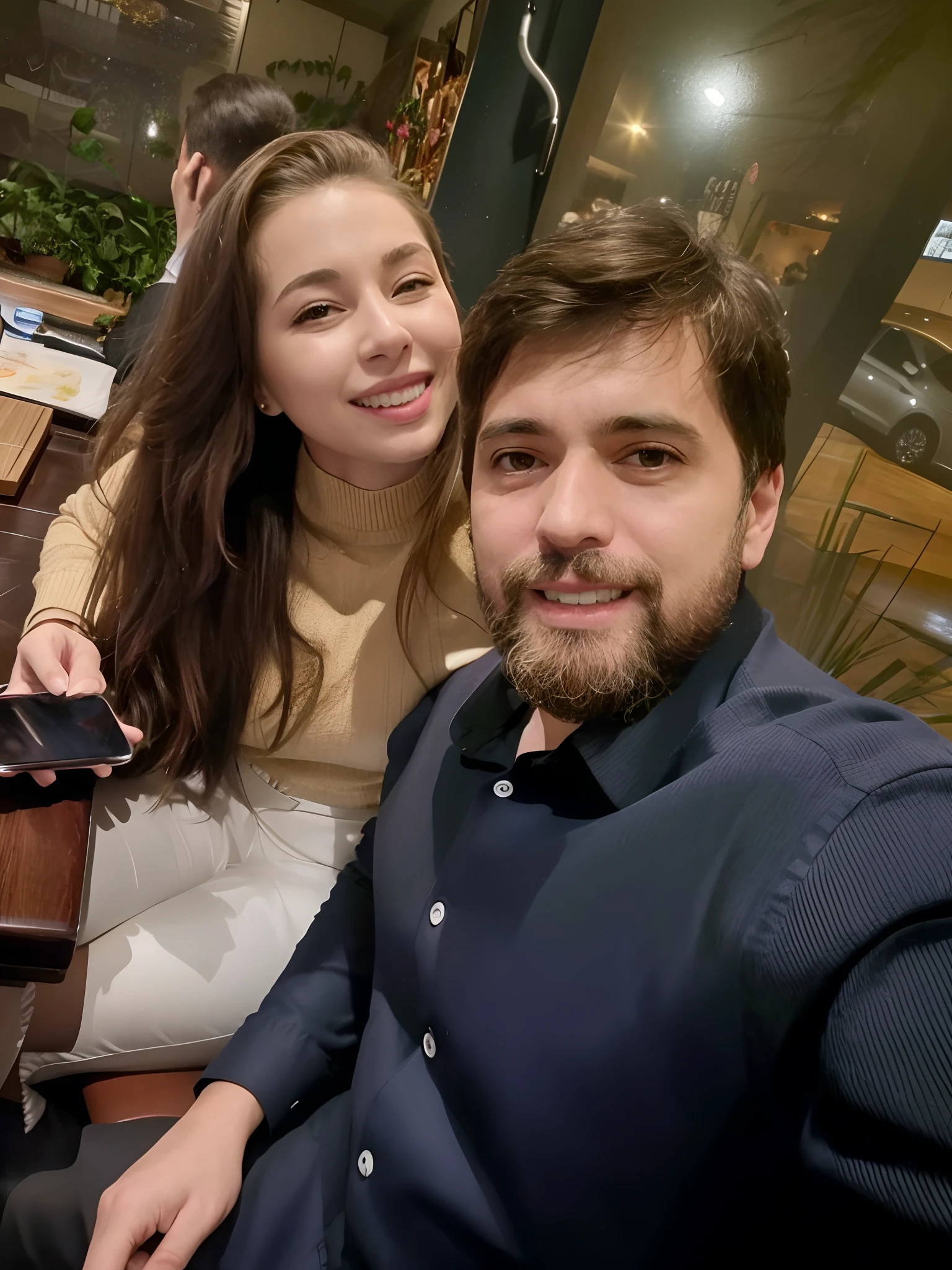 There is a man and a woman sitting at a table with a cell phone, Fotografia selfie 8k, Ayanamikodon e Irakli Nadar, Aykut Aydogdu, Casal feliz, imagem de qualidade muito baixa, Lovely couple, casal sorridente, Directed by: Nandor Soldier, foto do snapchat, Valentina Embaralhamento, Directed by: David Ruby