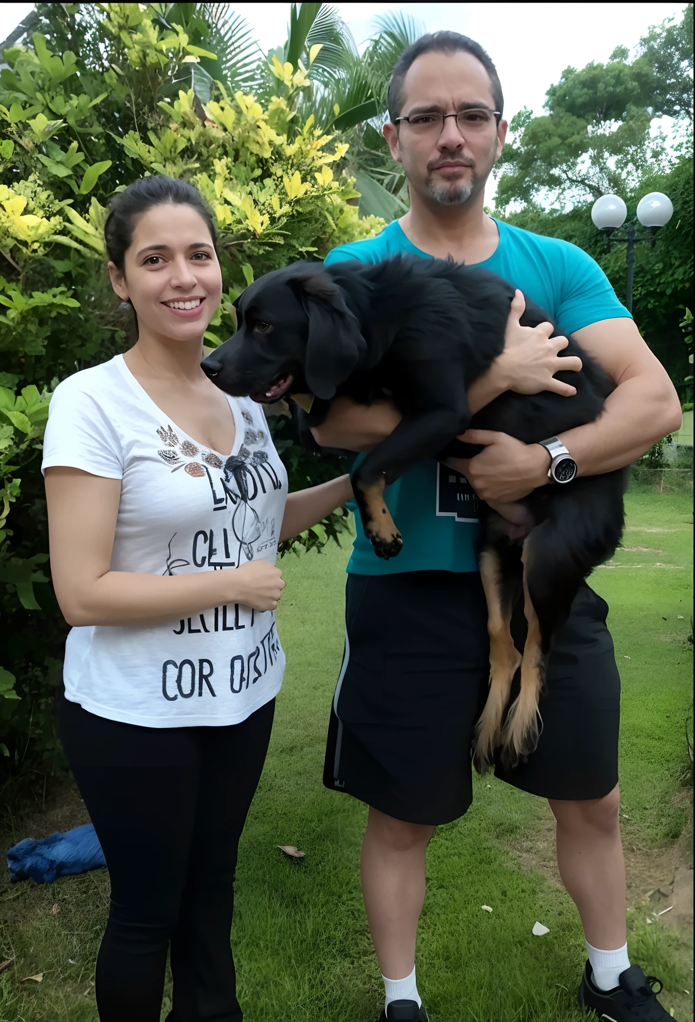 there is a man and woman holding a dog in a yard, Directed by: Ivan Ranger, Directed by: Andrée Ruellan, Directed by: Nandor Soldier, maximus jacobs, with dogs, Directed by: Judith Gutierrez, Directed by: Caro Niederer, Mulher de 30 anos de Cuba, with stray dogs, aw, with his hyperactive little dog