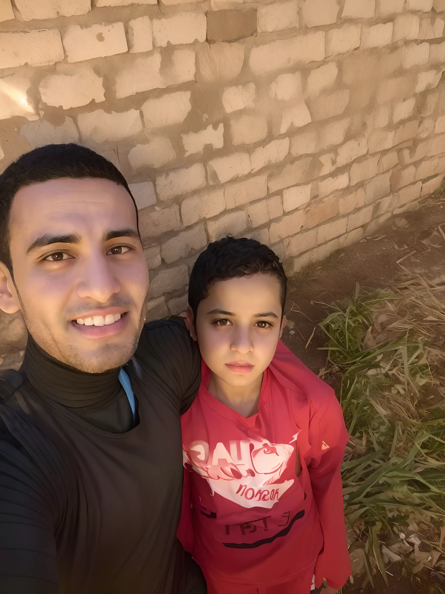 there is a man and a boy standing next to each other, imagem de qualidade muito baixa, Mohamed Chahin, Alex, Amr Elshamy, imagem antiga, do Egito, Emad Mostaque, with a kid, foto de perfil 1024px, No Egito, Atef, Imagem, Mohamed Reda, Riyahd Cassiem, uma imagem