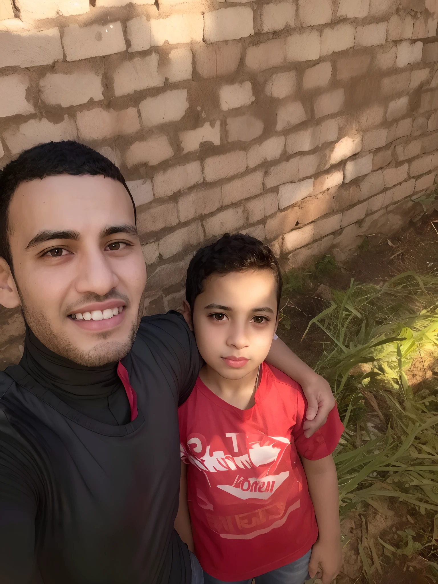 there is a man and a boy standing next to each other, imagem de qualidade muito baixa, Mohamed Chahin, Alex, Amr Elshamy, imagem antiga, do Egito, Emad Mostaque, with a kid, foto de perfil 1024px, No Egito, Atef, Imagem, Mohamed Reda, Riyahd Cassiem, uma imagem