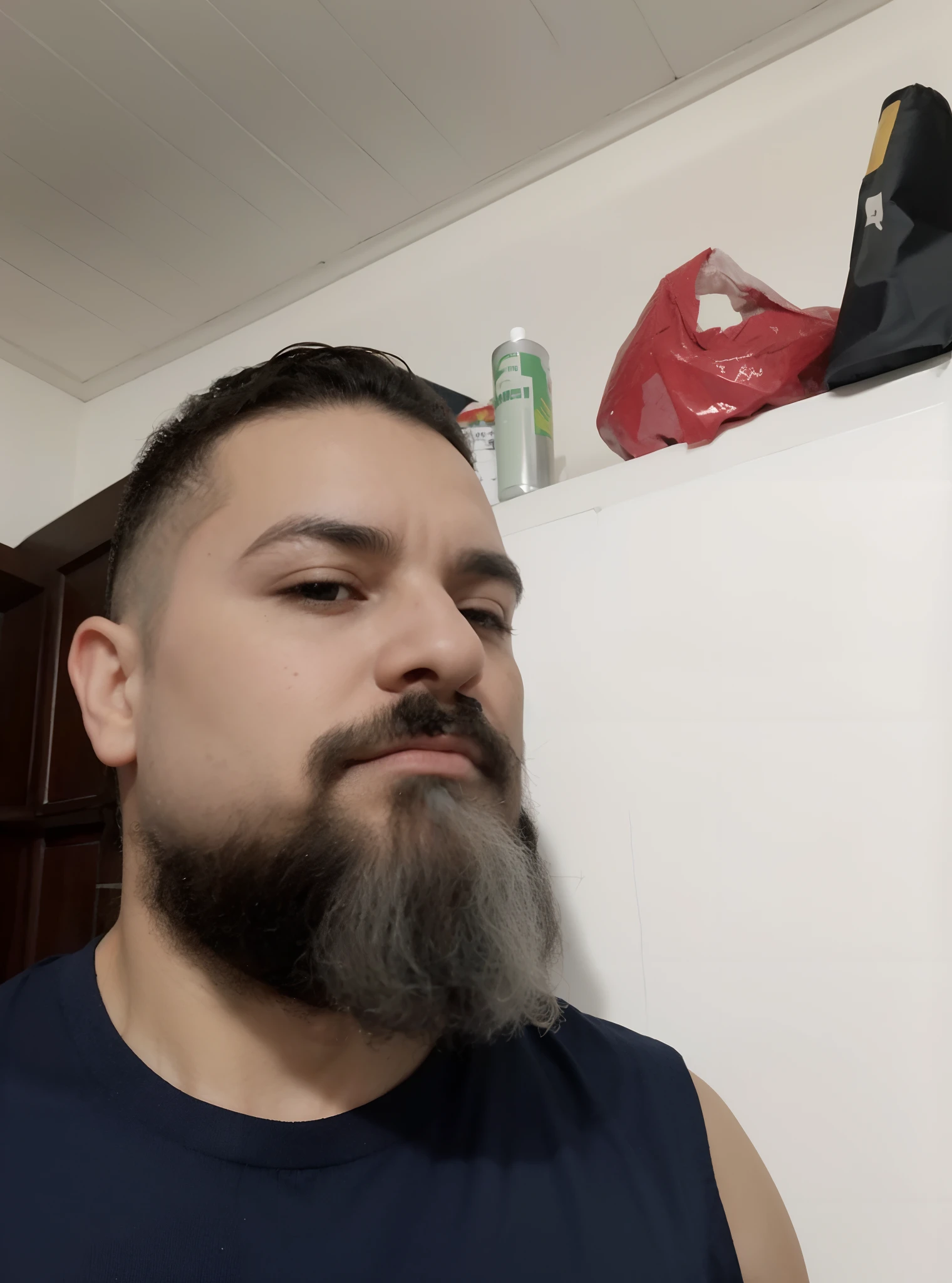 there is a man with a beard sitting on a bed, barba natural, (age 38), full beard, greybeard, messy beard, bearded, 45 years old men, Thick beard, 4 0 years old man, bearded and built, about 3 5 years old, bearded man, trimmed beard, Thick beard, age 38
