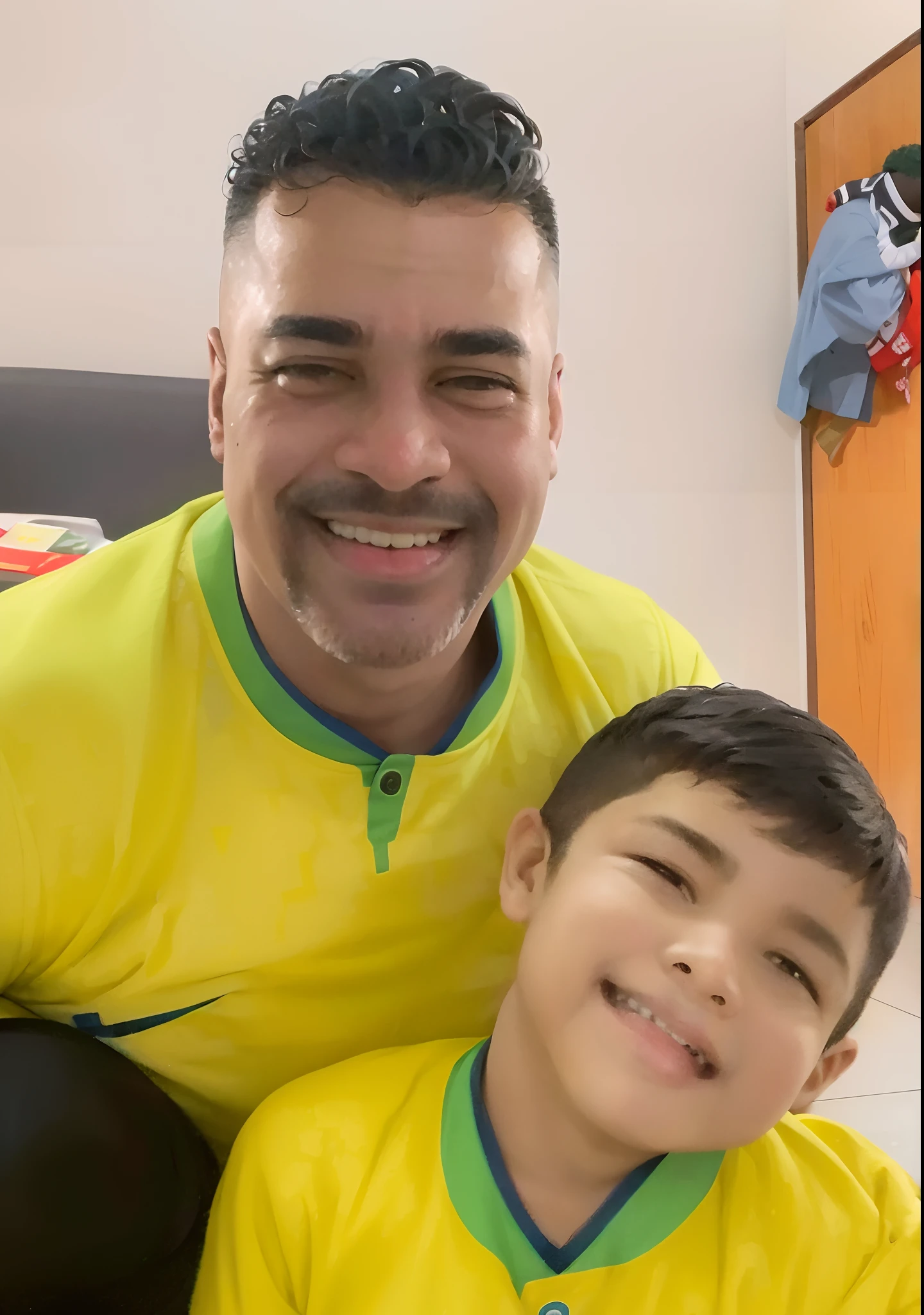 there is a man and a boy that are sitting together, ronaldo luis nazario da lima, ronaldo luis nazario de lima, ronaldo nazario fenomeno, ronaldo nazario, edu souza, caio santos, carmelo blandino, david rios ferreira, mohamed reda, icaro carvalho, romero ressendi, by Nándor Katona