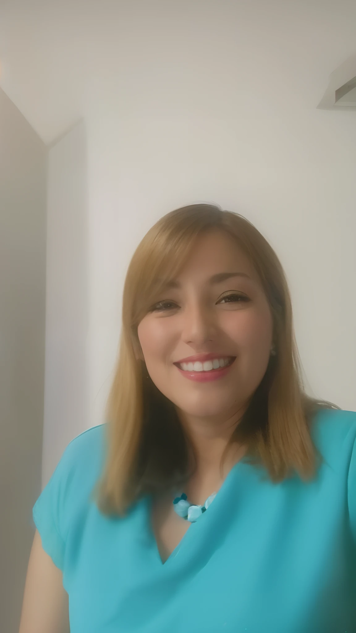 Smiling woman in blue shirt standing in front of a white wall, imagem de perfil, Lorena Avarez, Estefania Villegas Burgos, Adriana DXIM, foto do perfil, fernanda suarez, Directed by: Nandor Soldier, coluna, foto de perfil, imagem de qualidade muito baixa, Magda Torres Gurza, Magalie Villeneuve