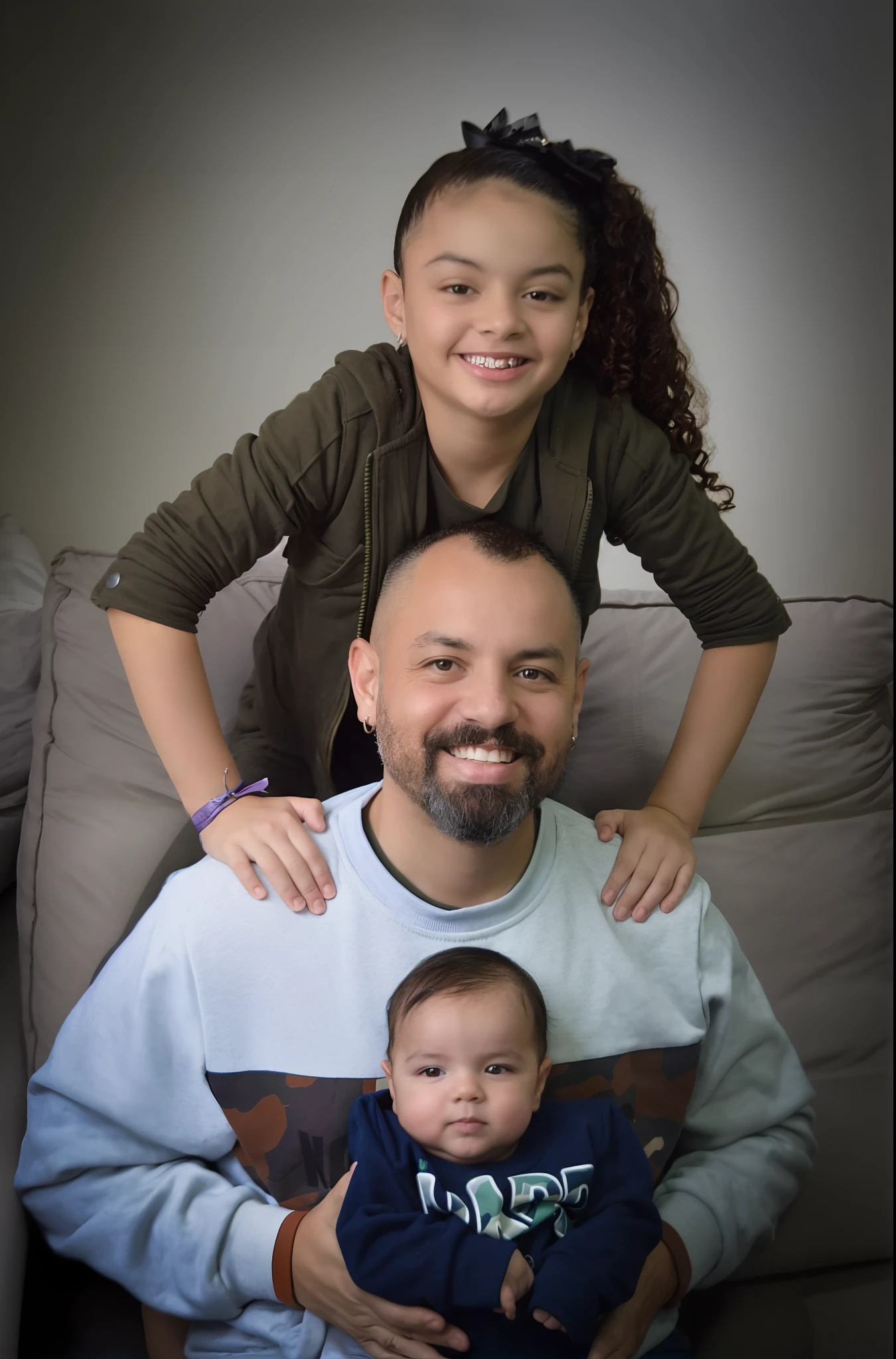 family photo of husband and wife and 2 sons