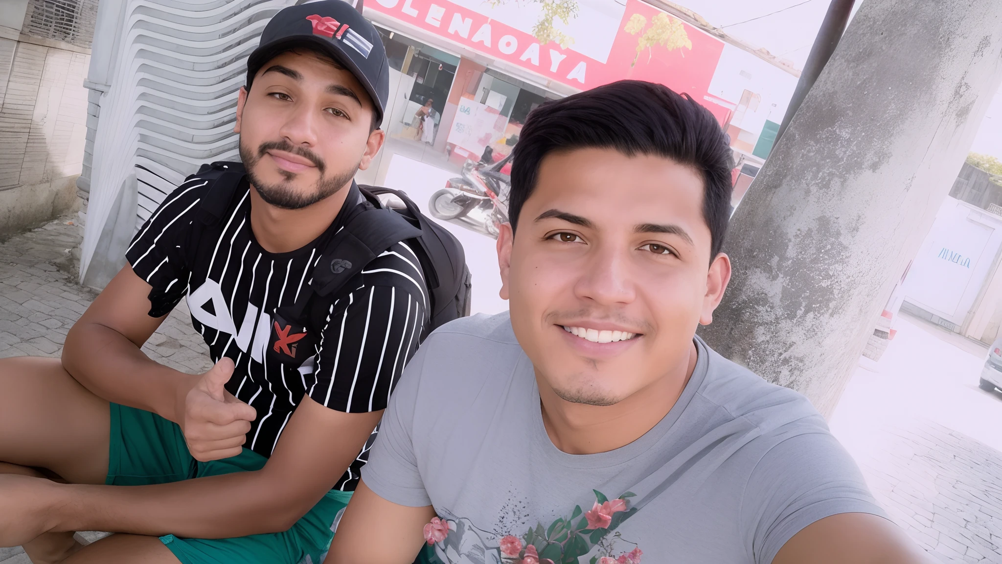 There are two men sitting on the ground outside a building, Paulo Pepera Pablo Roldan, Foto realista, foto de perfil, imagem do avatar, andres rios, Jose Miguel Romano Francisca, dois rapazes, zigor samaniego, instagram post, Ronaldo Luis Nazario de Lima, Postagem no Reddit, Pablo Carpio e Jordan Grimmer, Devagar