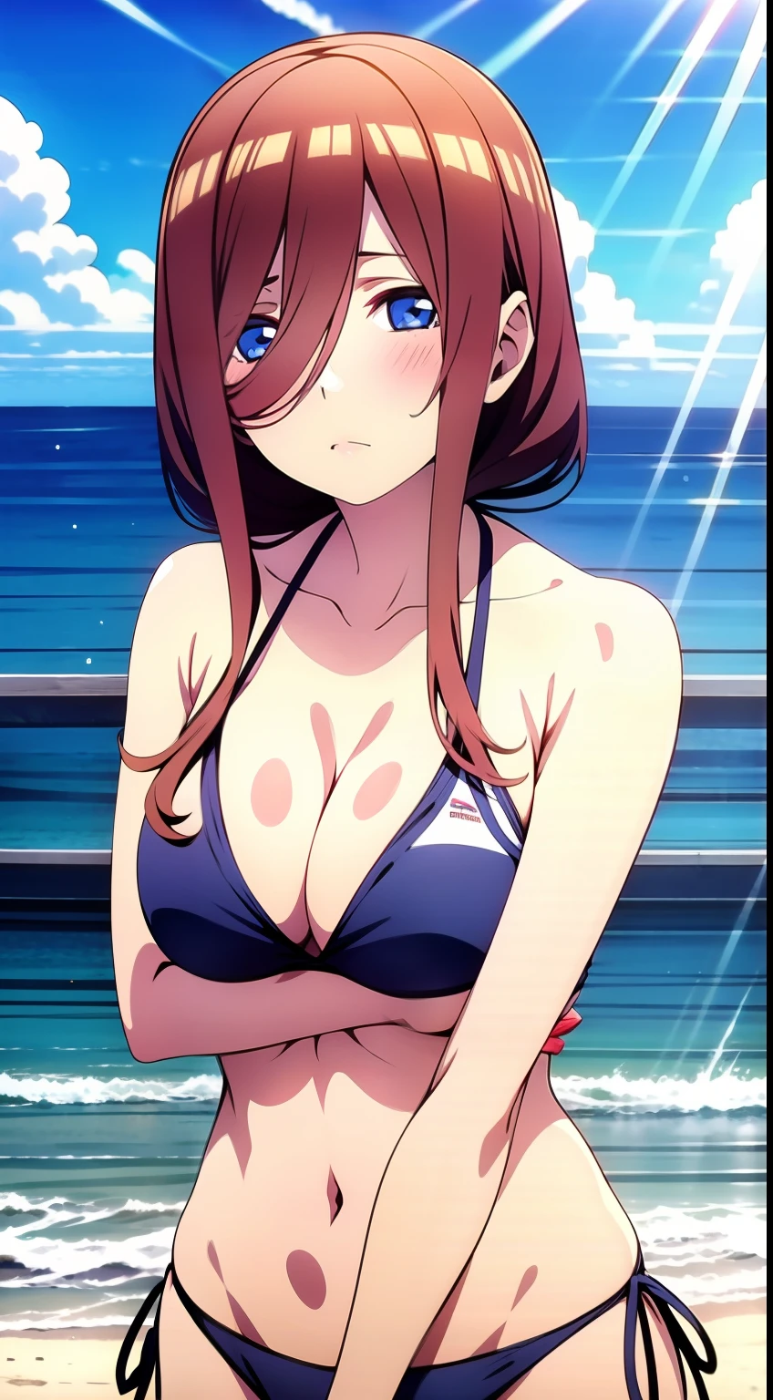 Girl on a beach in a bikini making the L foramen with her hands