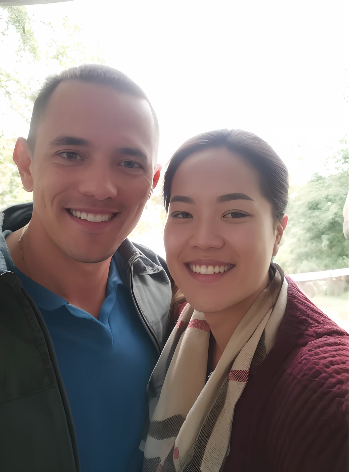 casal sorridente posando para uma foto em frente a uma janela, Casal feliz, Thomas Anthony e Malika Favre, Jordan Grimmer e Natasha Tan, Ruan Jia e Mandy Jurgens, Directed by: Lee Loughridge, Tyler Edlin e Natasha Tan, Foto tirada em 2018, belos arredores, both smiling for the camera, casal sorridente