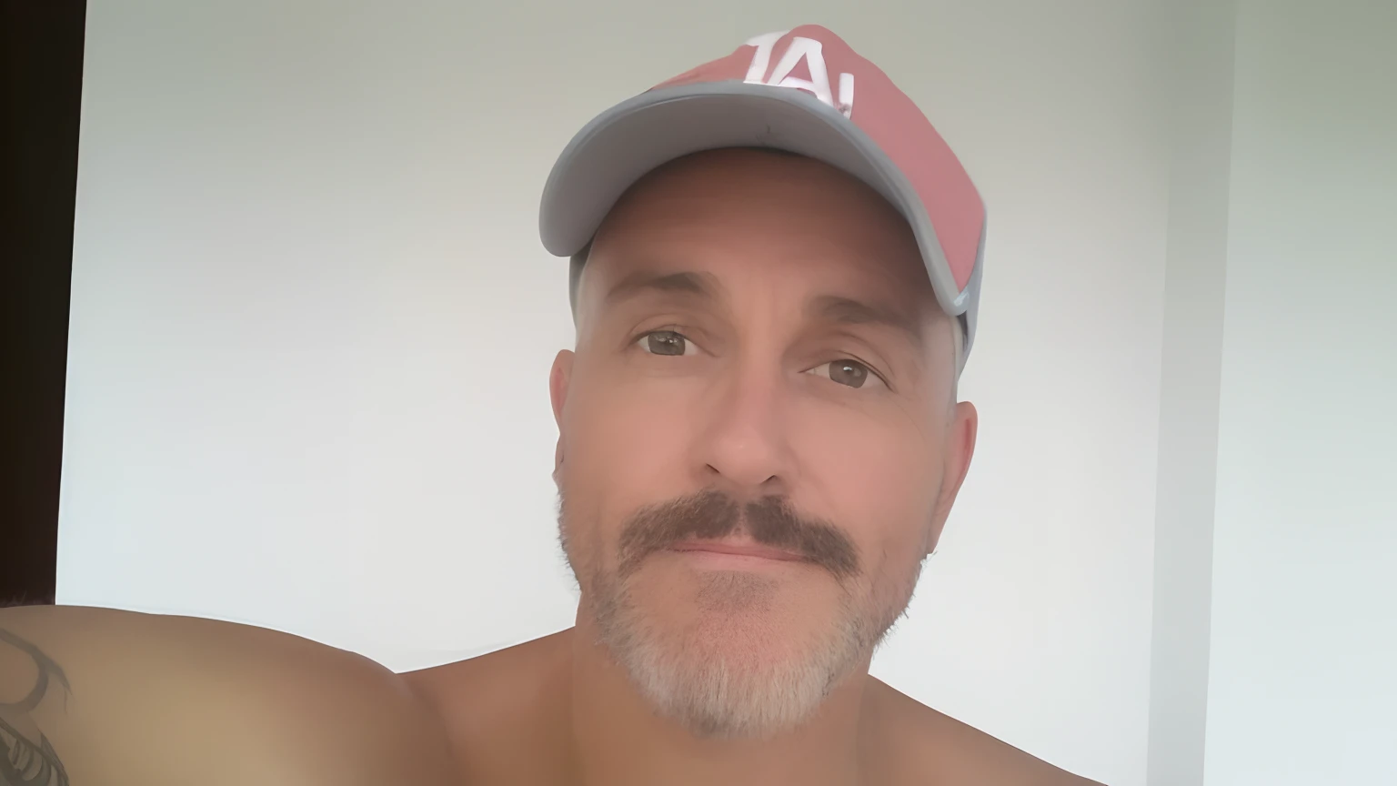Criar poster de cinema, Pixar animation style with man image, 49 anos, cabelos e barbas curtos e grisalhos. He wears a trucker-style cap and is shirtless. Tem bele branca.