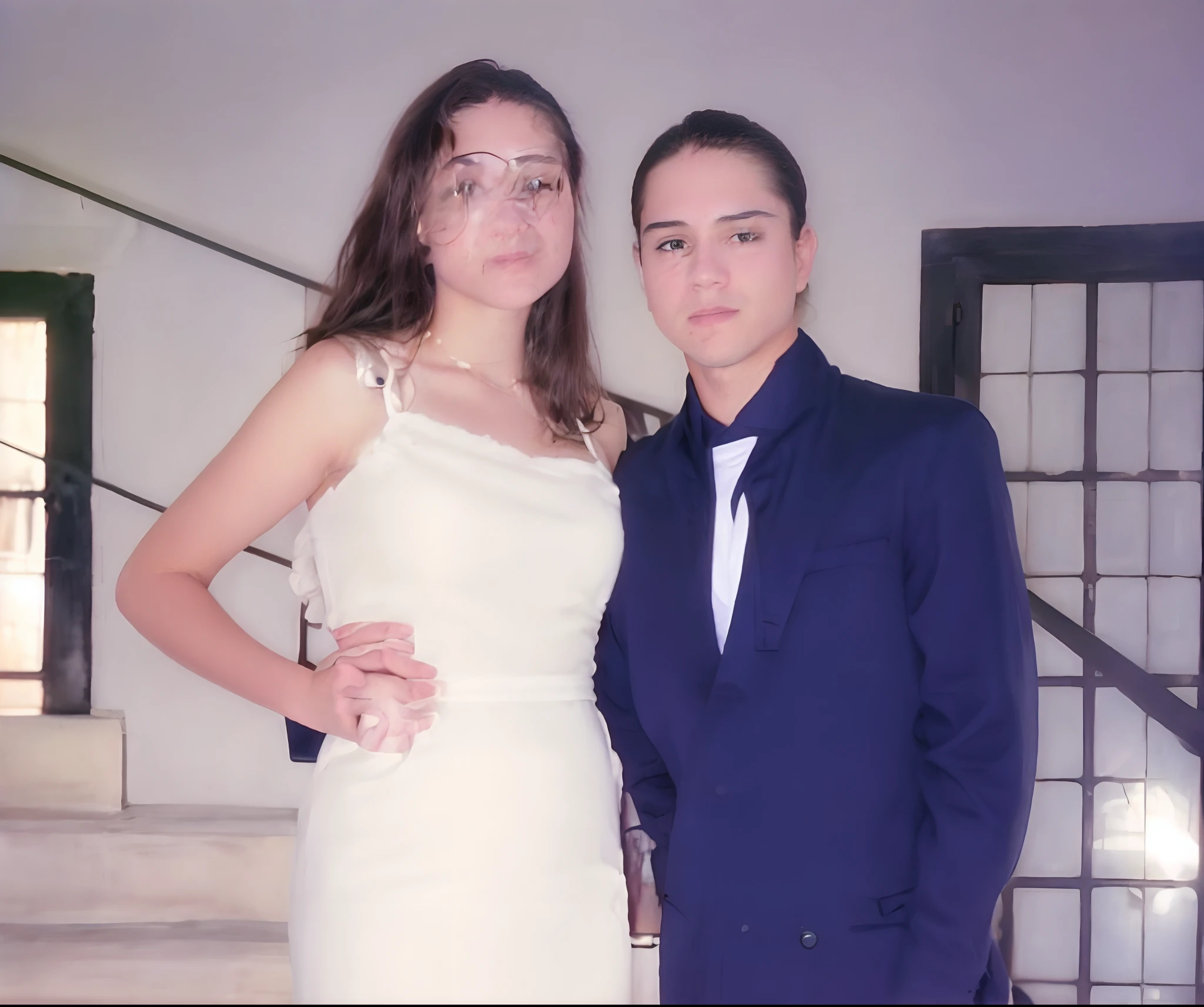 there is a man and woman standing next to each other, final dos anos 2000, tiradas em meados dos anos 2000, tiradas nos anos 2000, foto 1998, Beginning 2 0 0 0 s, Early 2000s, tiradas no final dos anos 2000, em torno de 1 9 anos, vestido de noiva simples, terno, estilo Pixar, dentro de uma escadaria de castelo.