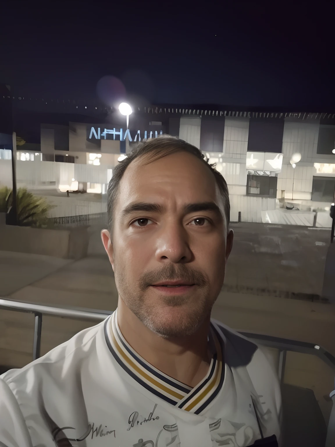 Man dressed as realtor in front of a beautiful house