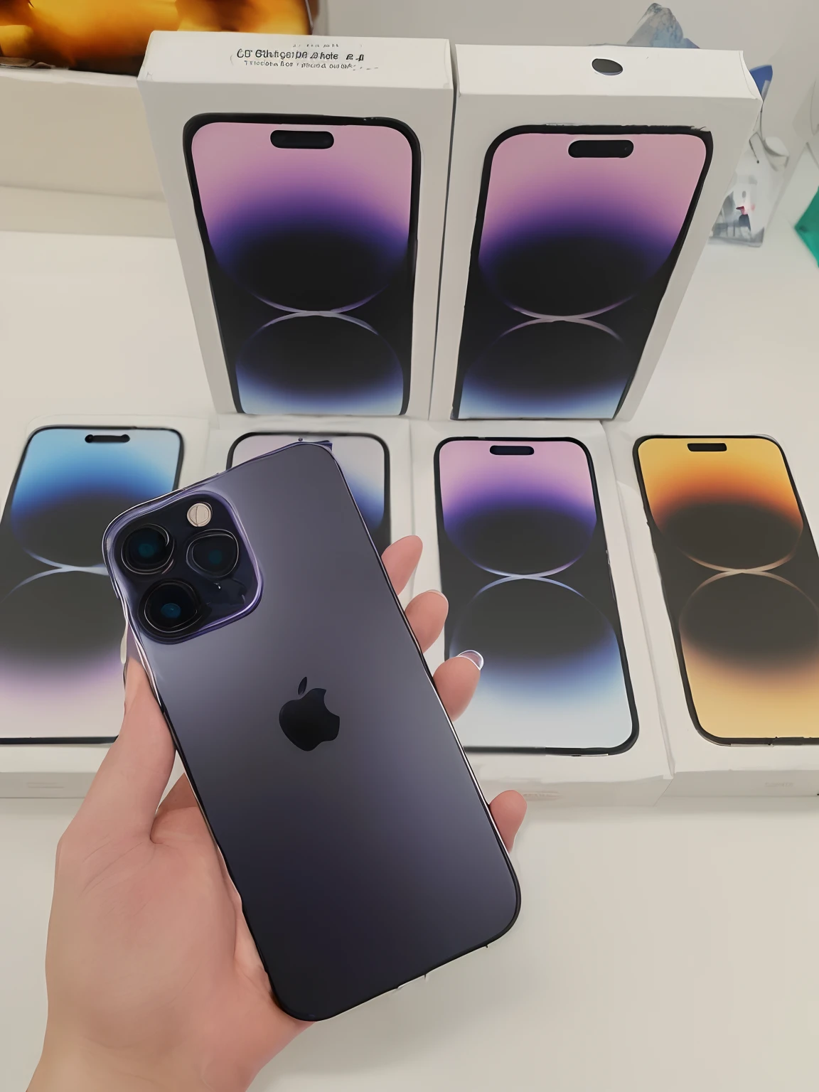 (best quality,4k,8k,highres,masterpiece:1.2),ultra-detailed,(realistic,photorealistic,photo-realistic:1.37),a person holding a black iPhone with a purple and blue design, iPhone 13 Pro Max, vivid colors, sharp focus, iPhone 1 3 Pro Max, iPhone 12, 2 5 6 x 2 5 6, 256x256, year 2022, portraits, studio lighting
