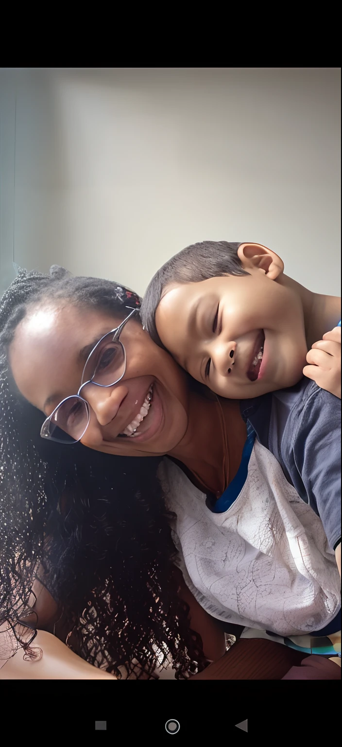 There is a woman and a child who are smiling together