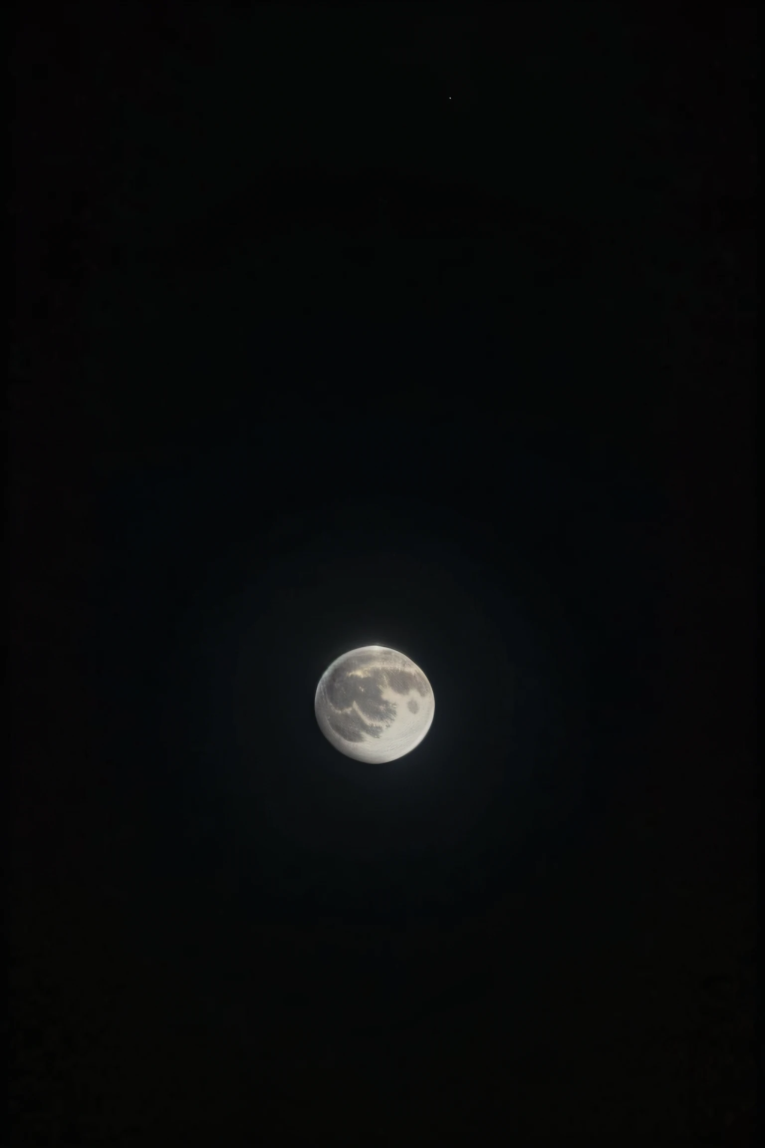 Close-up image of the moon in the dark sky